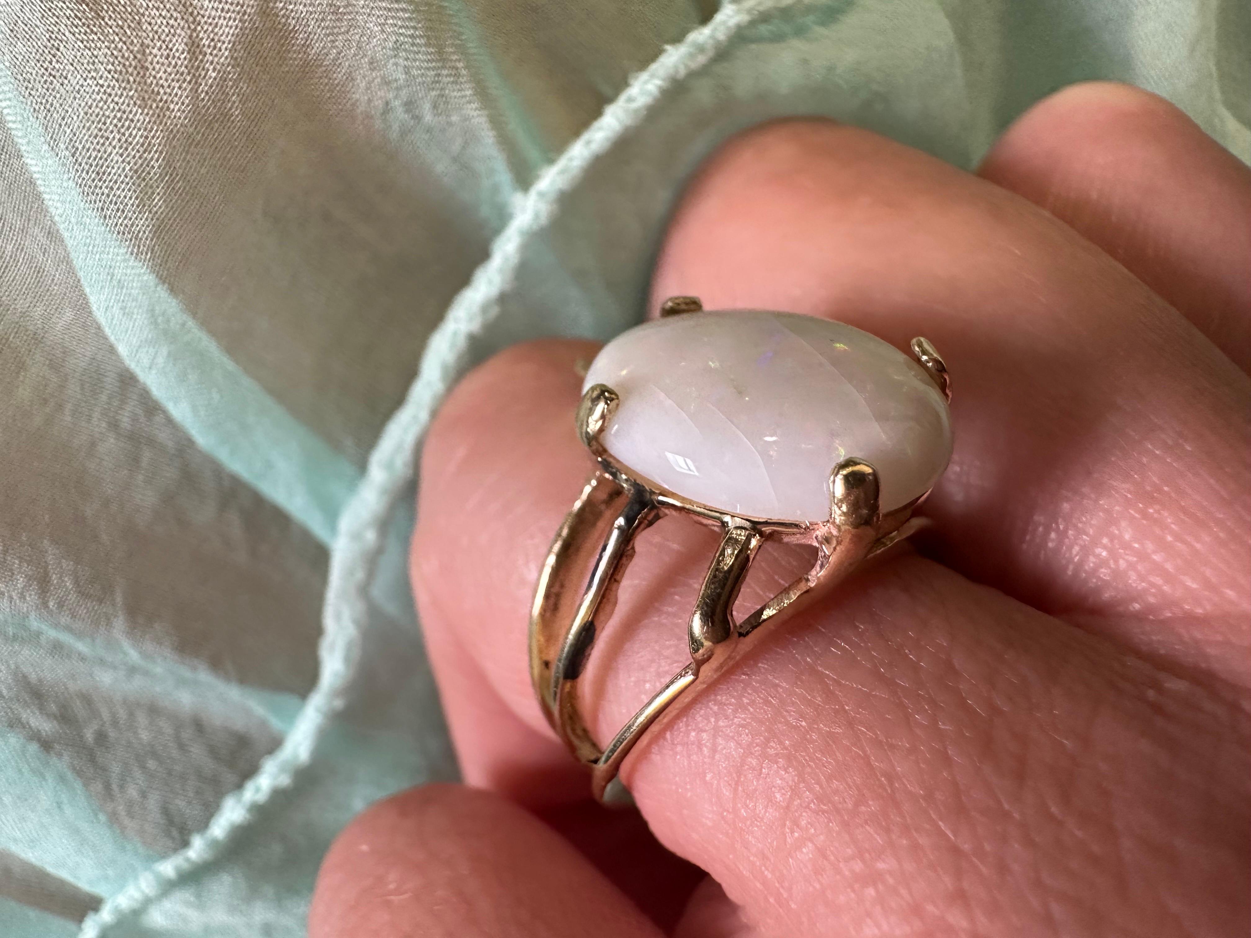 Not very standard for an opal ring, designer clearly wanted an organic feel to the ring, the opal is beautiful and natural the ring is made in 14Kt gold. Artist unknown.
Metal Type: 14KT
Certificate of authenticity comes with purchase

ABOUT US
We