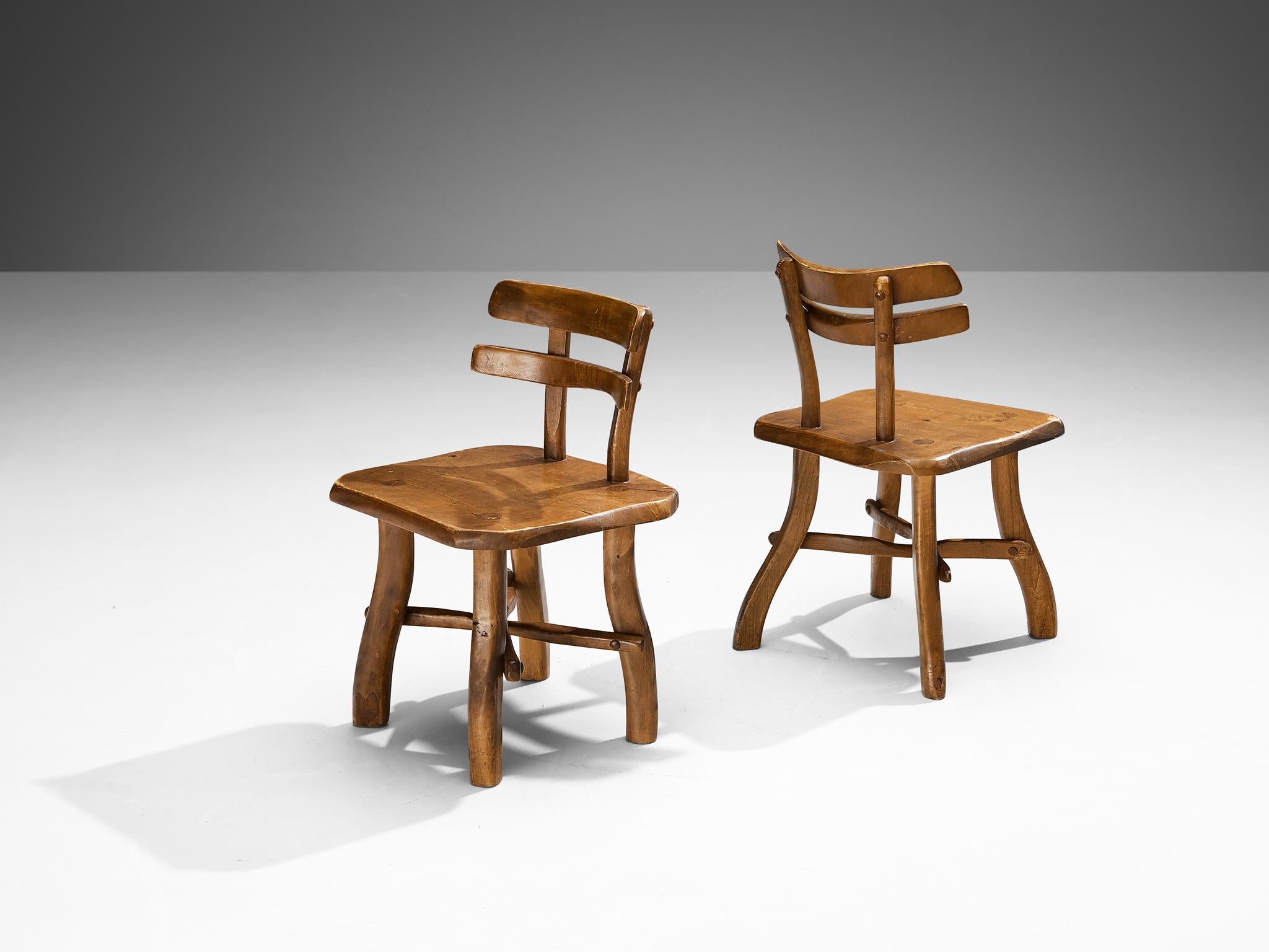 Brutalist chairs, maple, Europe 1960s 

Beautiful and naturalistic chairs made in Europe in the 1960s. These pieces have a strong decorative element, the double backrests of these pieces are the perfect combination of a brutalist character and
