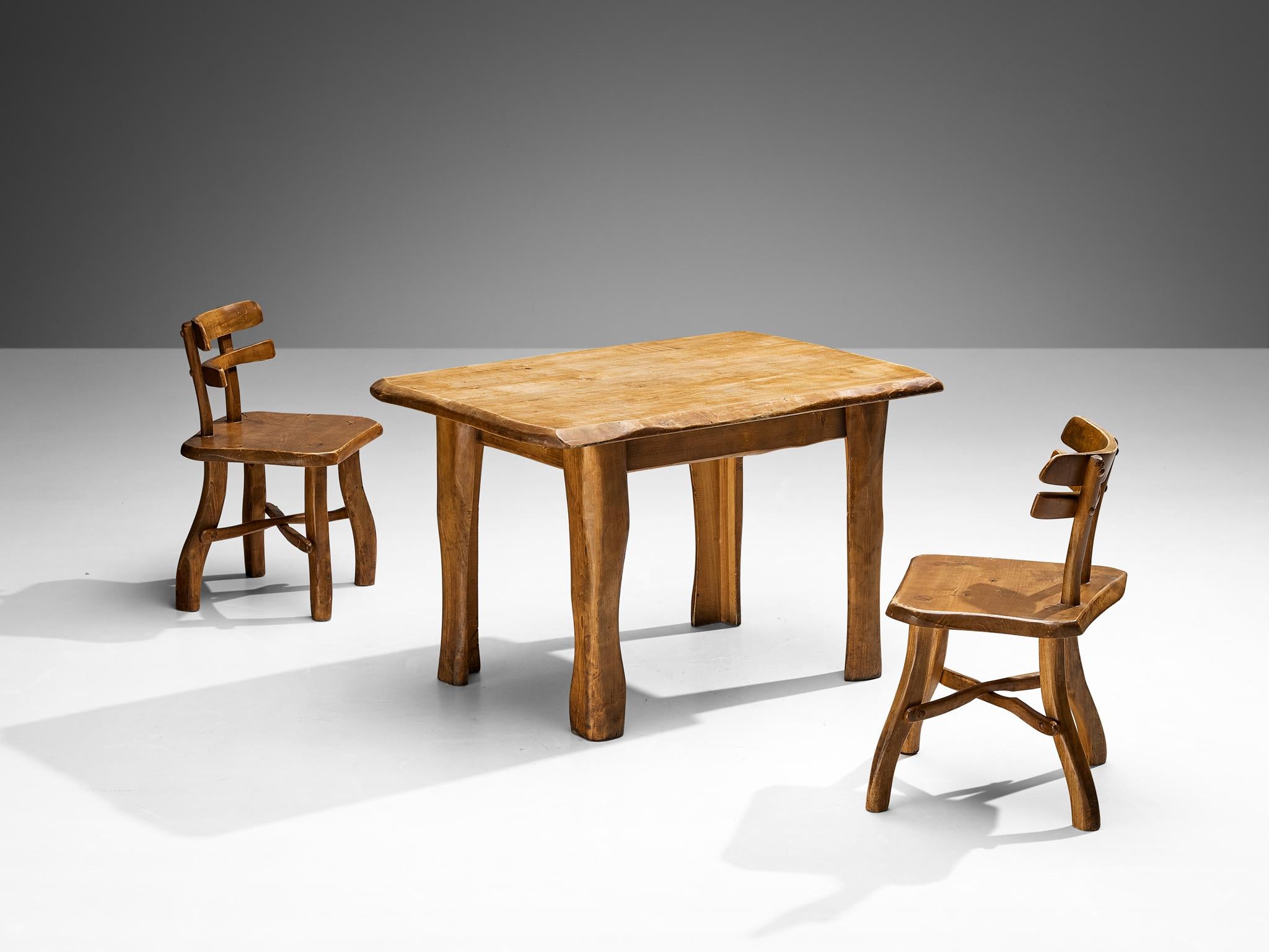 Brutalist set of chairs and dining table, maple, Europe, 1960s 

Beautiful and naturalistic set consisting of a table and two chairs made in Europe in the 1960s. The chair features a backrest consisting of two pieces of maplewood. Another slab is