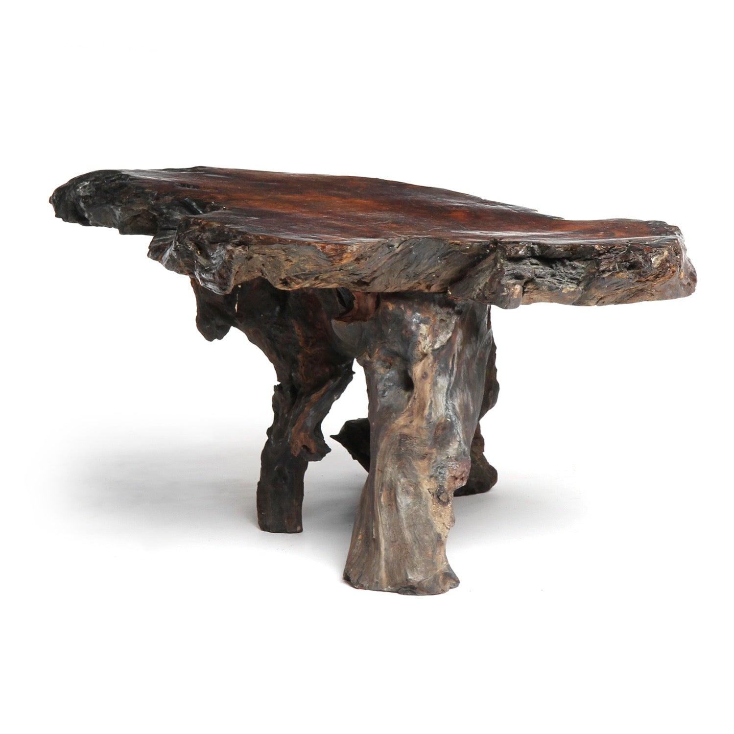 A substantial freeform burl redwood low table.