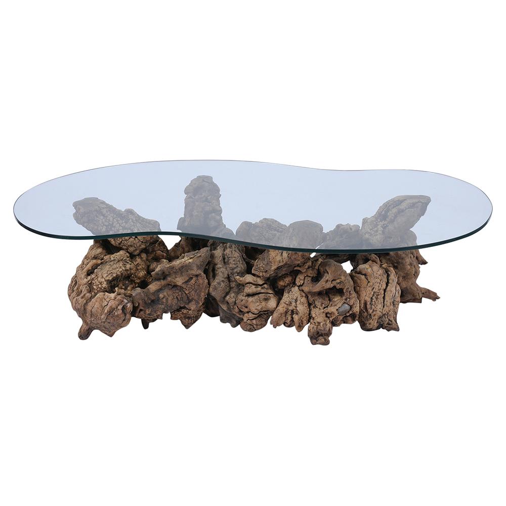 This natural freeform burl coffee table is in great condition and made out of solid walnut wood with a unique sun-bleached color finish. The table features a new 3/8 inch thick kidney-shaped temper glass top with a flat polish finish and rests on an
