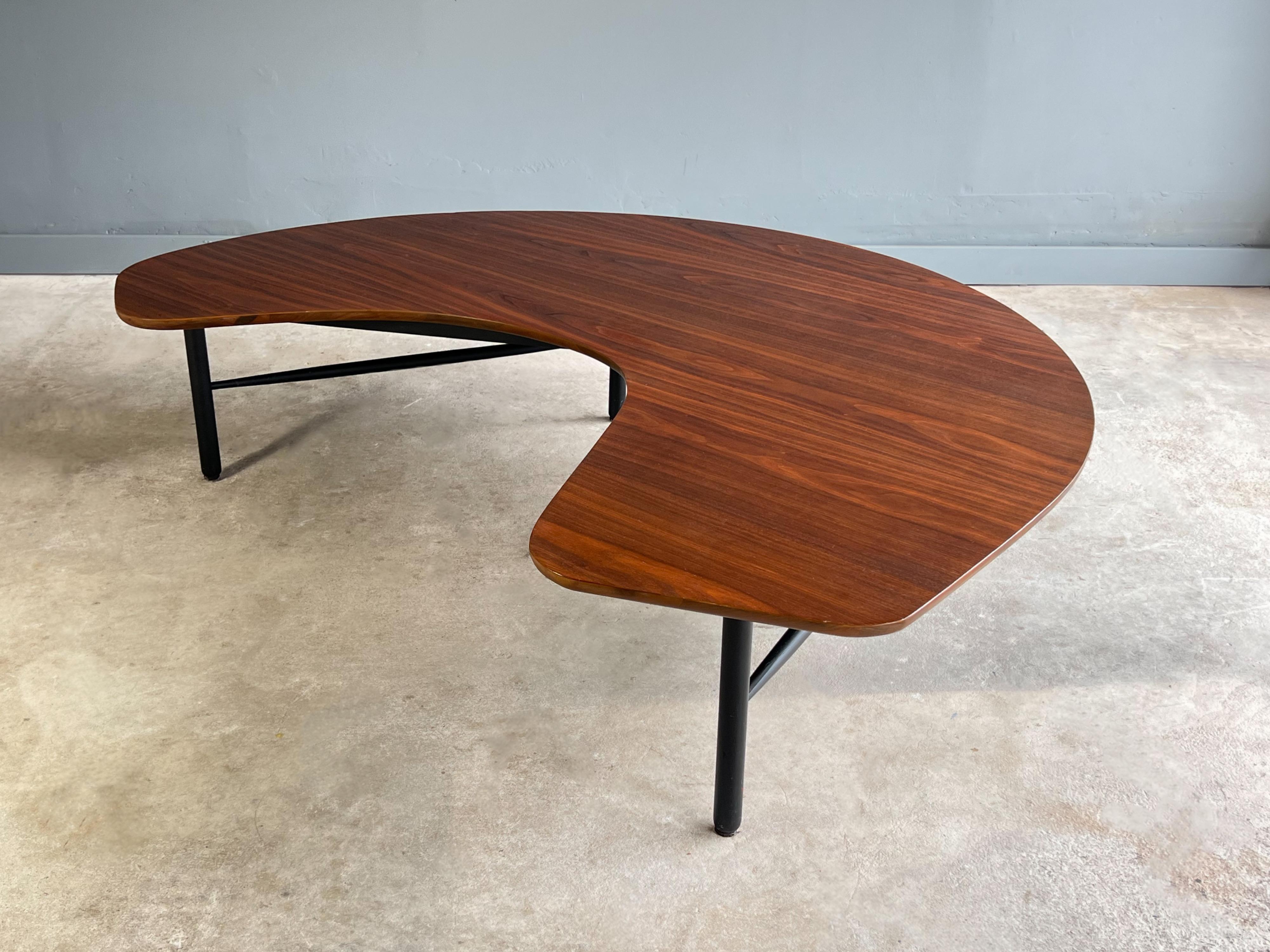 Amazing and rare “crescent moon” coffee table by Greta M. Grossman.

 This organic stunner was designed in 1952 for Glenn of California and is true to Grossman’s whimsical designs. 

The great thing about this design is it can be placed in a variety