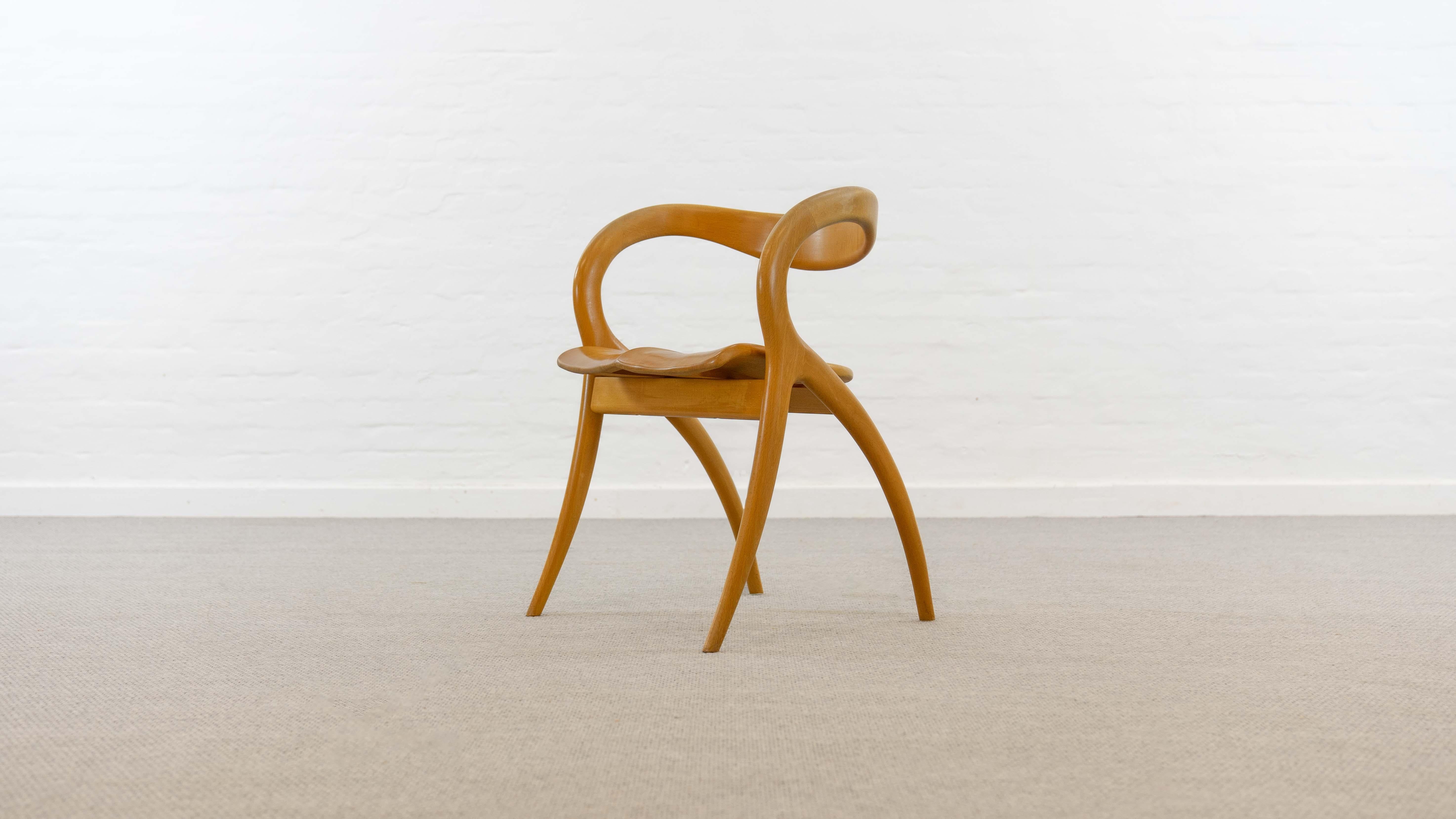 Organic Design at its best. Italian Armchair by A. Sibau, 90s. Executed in massiv cherrywood. Good vintage condition. Slight signs of use at the armrests. Stains on seatarea. No smoking object.