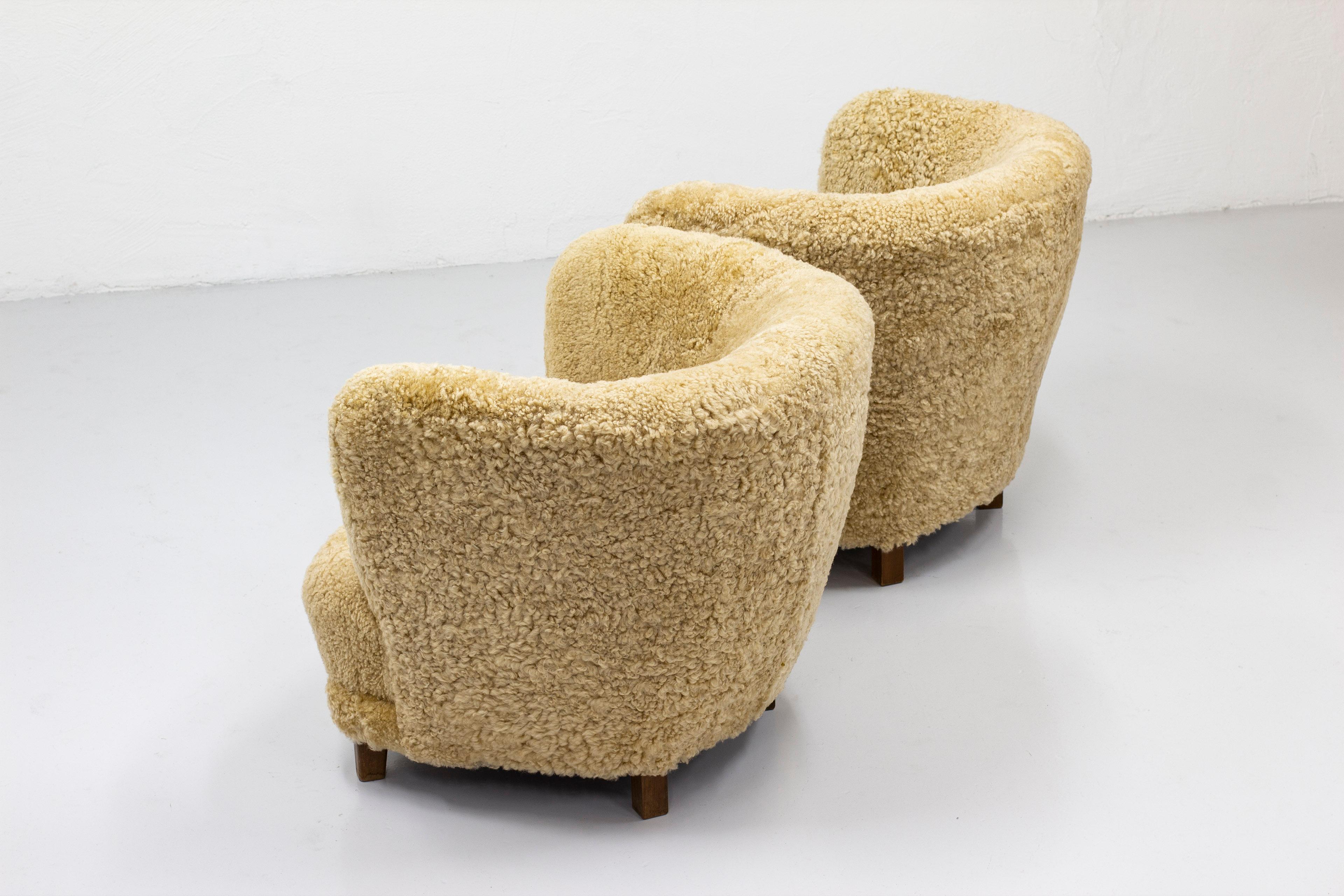 Scandinavian Modern Organic Danish Modern Lounge Chairs with Sheepskin, Denmark, 1950s