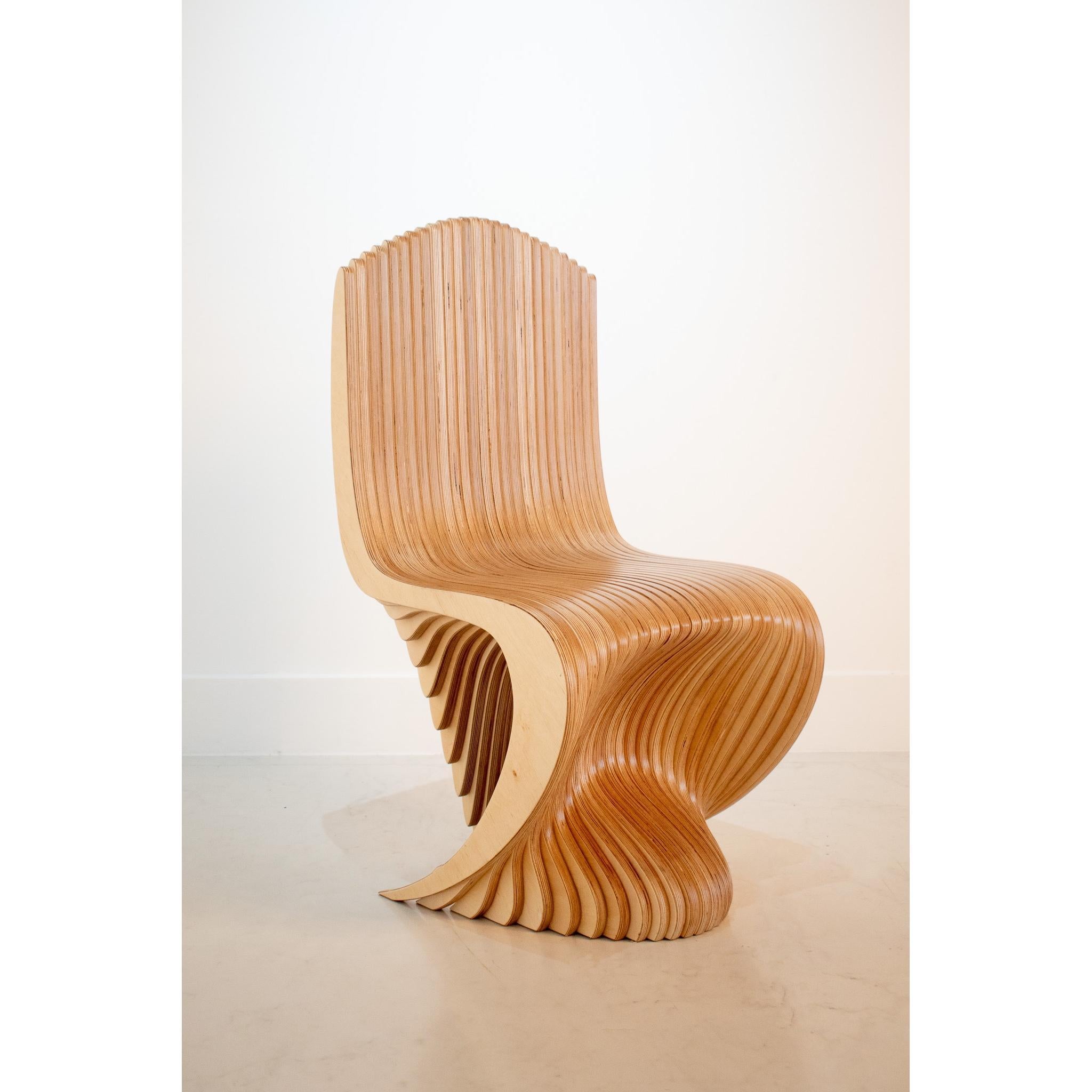 A contemporary dining Chair, handmade in the U.K by us at Antique Modern Mix, this collection of curvaceous furniture is made from Birch plywood which is FSC certified which means it is sourced from sustainably managed forests.

The collection
