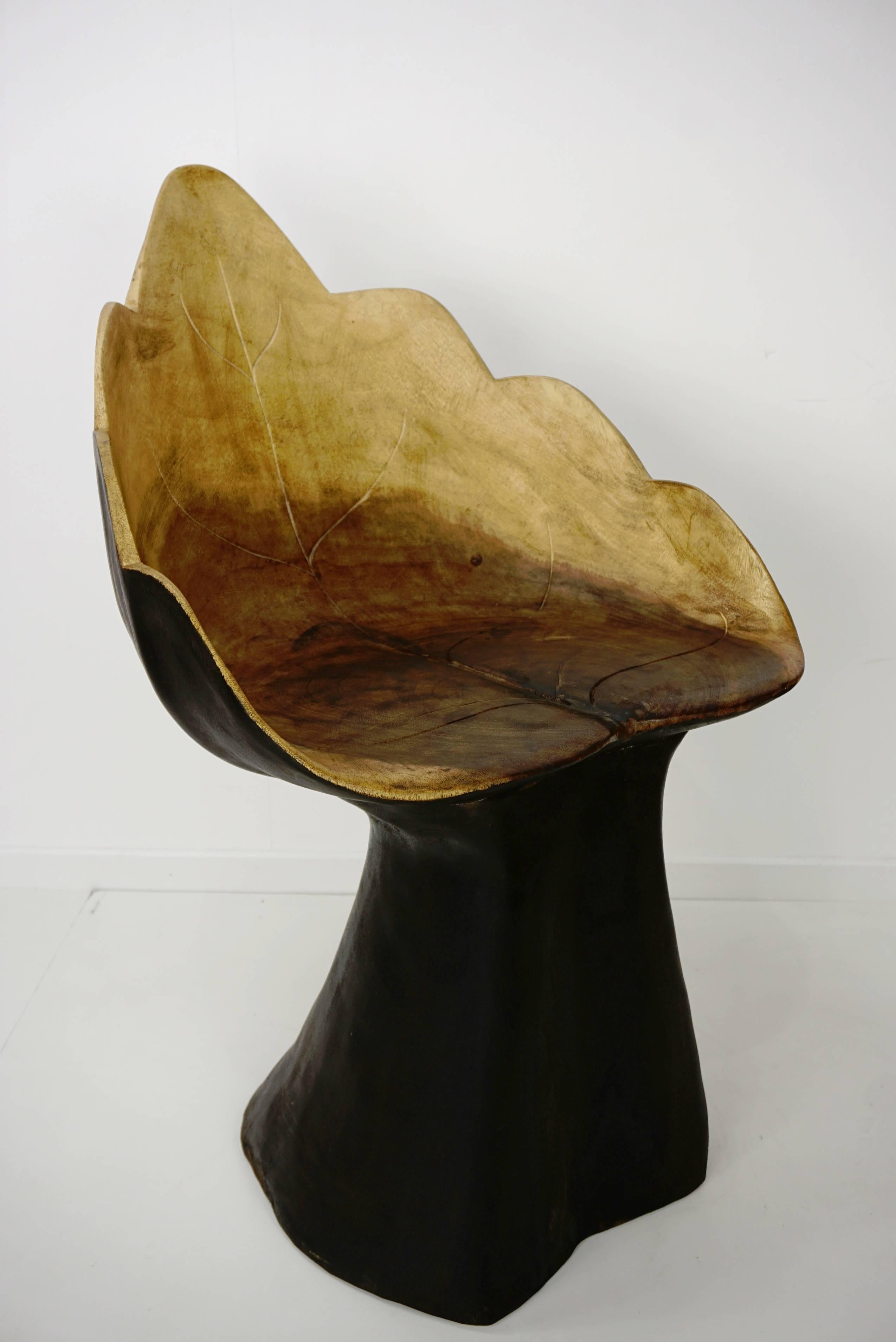 Organic design solid wood armchair.