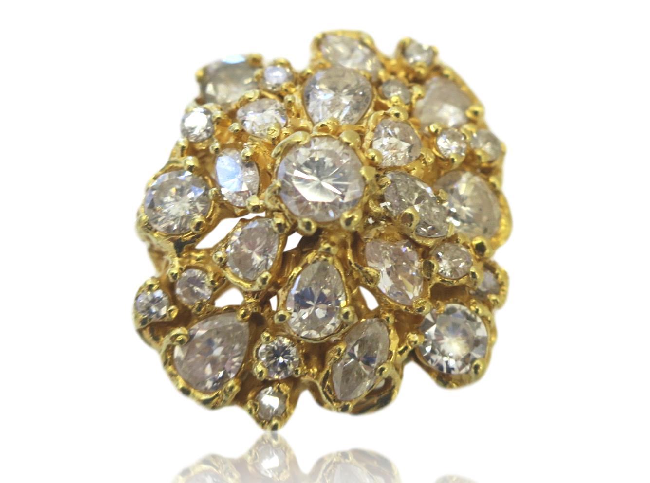 Freeform yellow gold diamond cluster ring. The 1