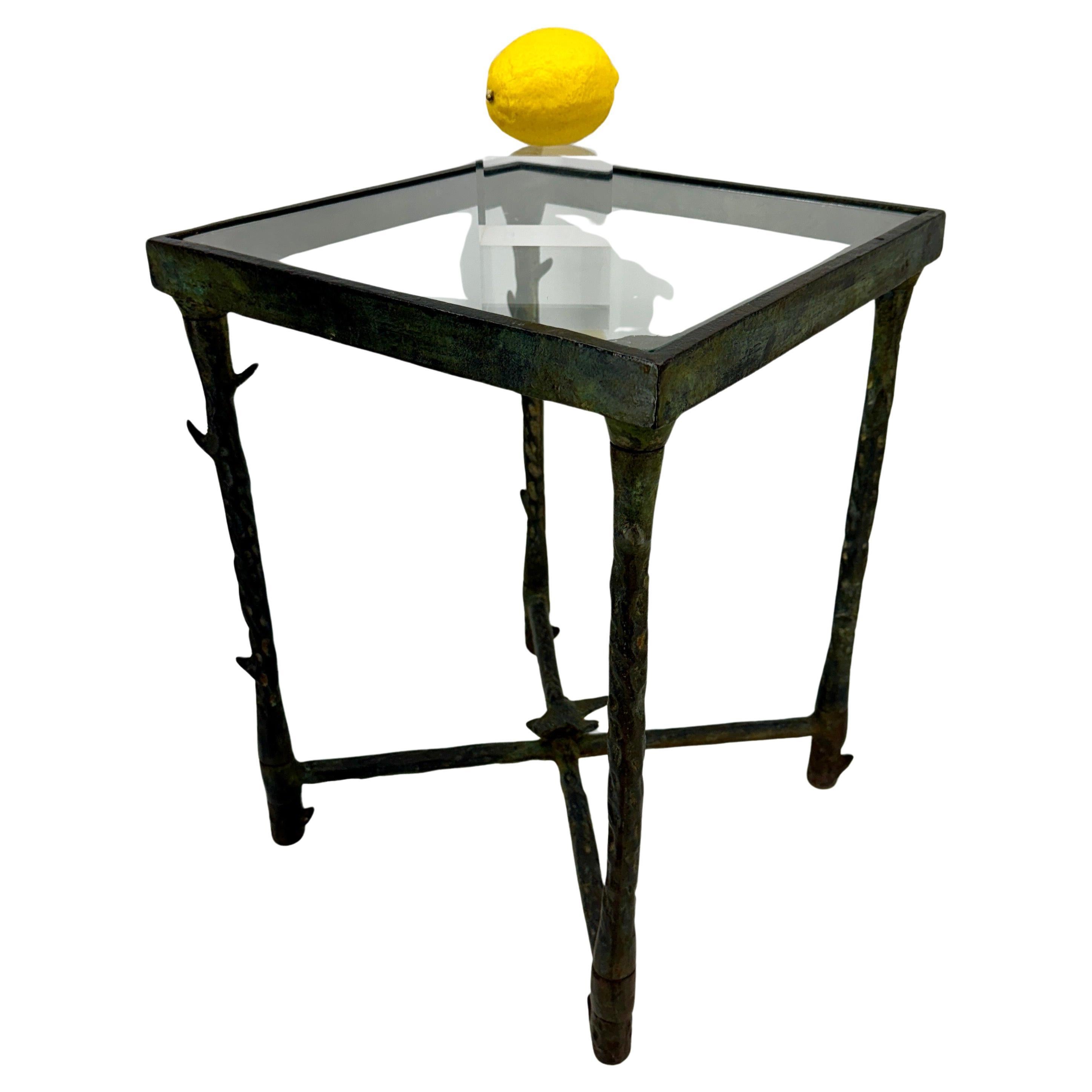 Cast Iron Accent Side Table with Square Glass Top

Unique Mid-Century hand-crafted metal table with branches and a bird, perfect used formally or informally. This eye-catching, versatile table will certainly be a conversation piece wherever placed