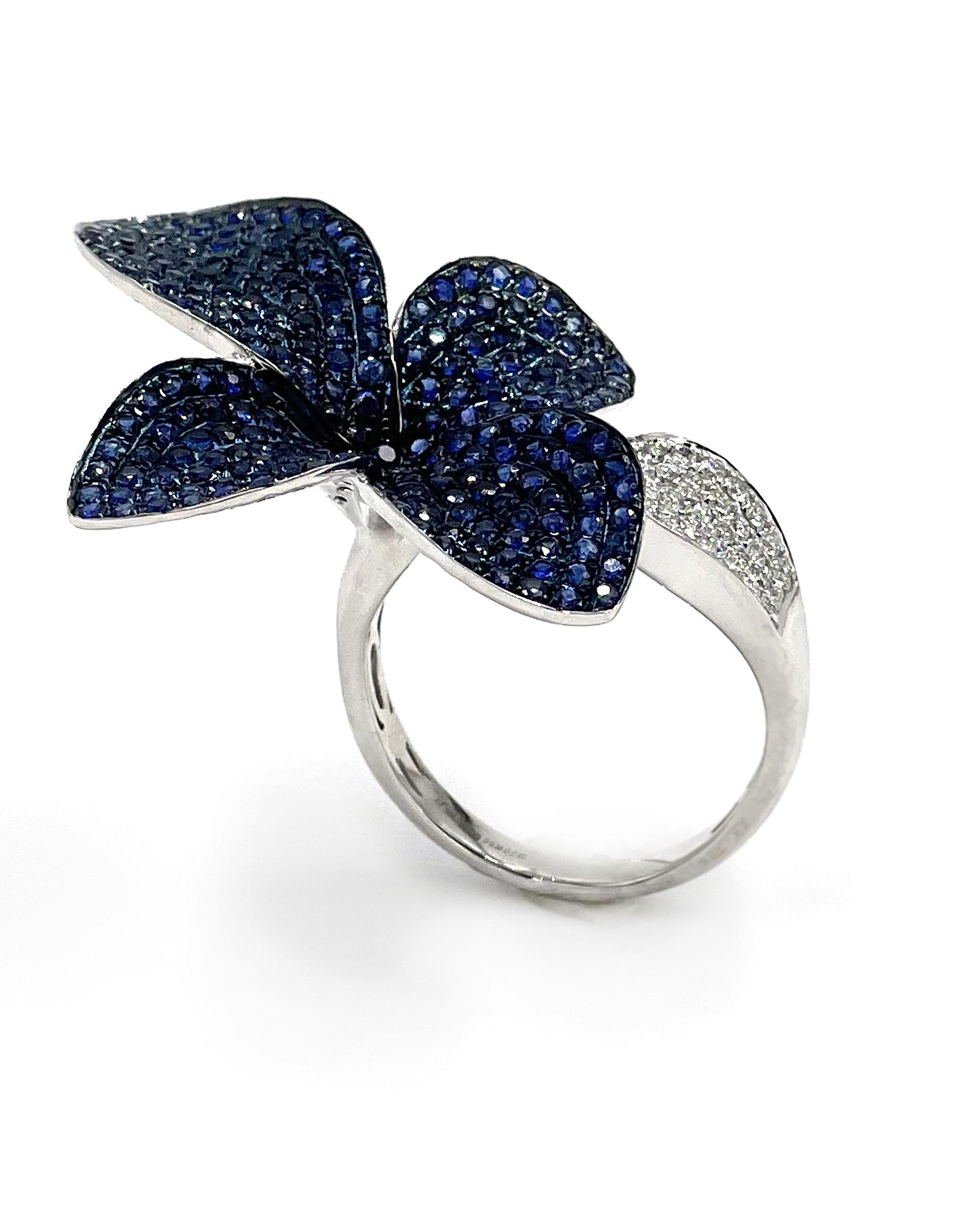 Beautiful unique 18K white gold organic flower butterfly ring with 0.34 carat diamonds and 2.45 carats blue sapphires.

- Finger size: 7.5
- Diamonds and sapphires are micro pave set
- Diamonds are F/G color, VS Clarity
- Very comfortable to wear