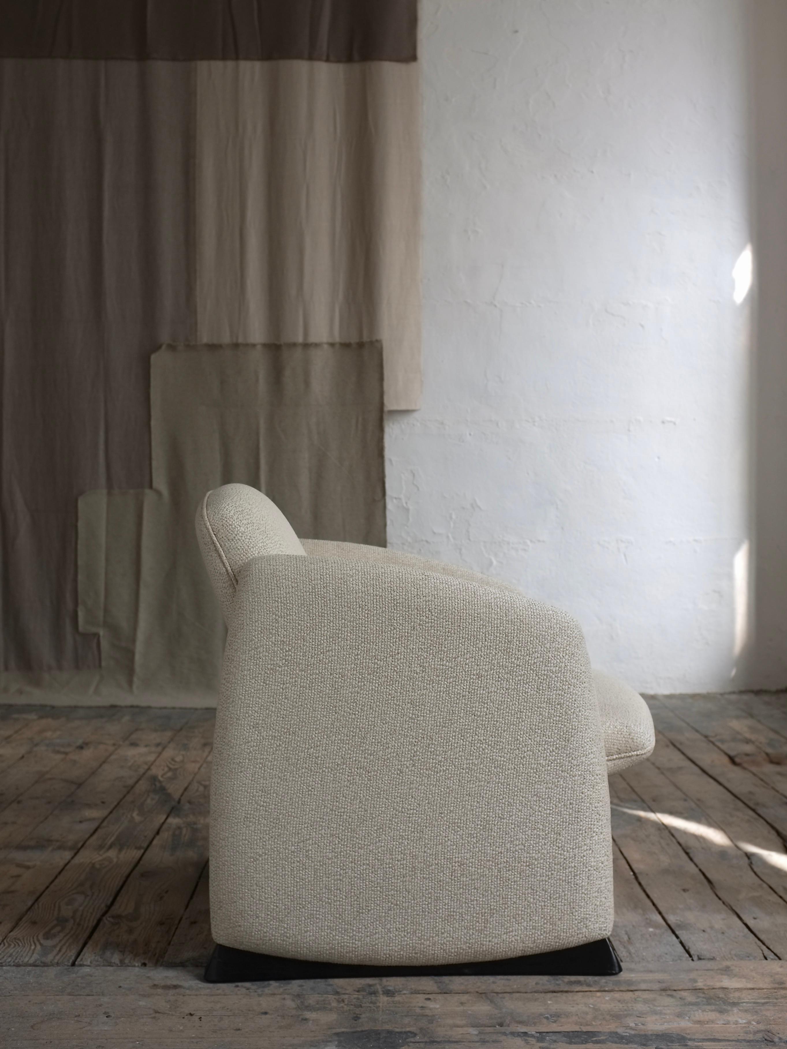 Vintage organic form lounge chair with sculptural solid wood legs. Heavy item.