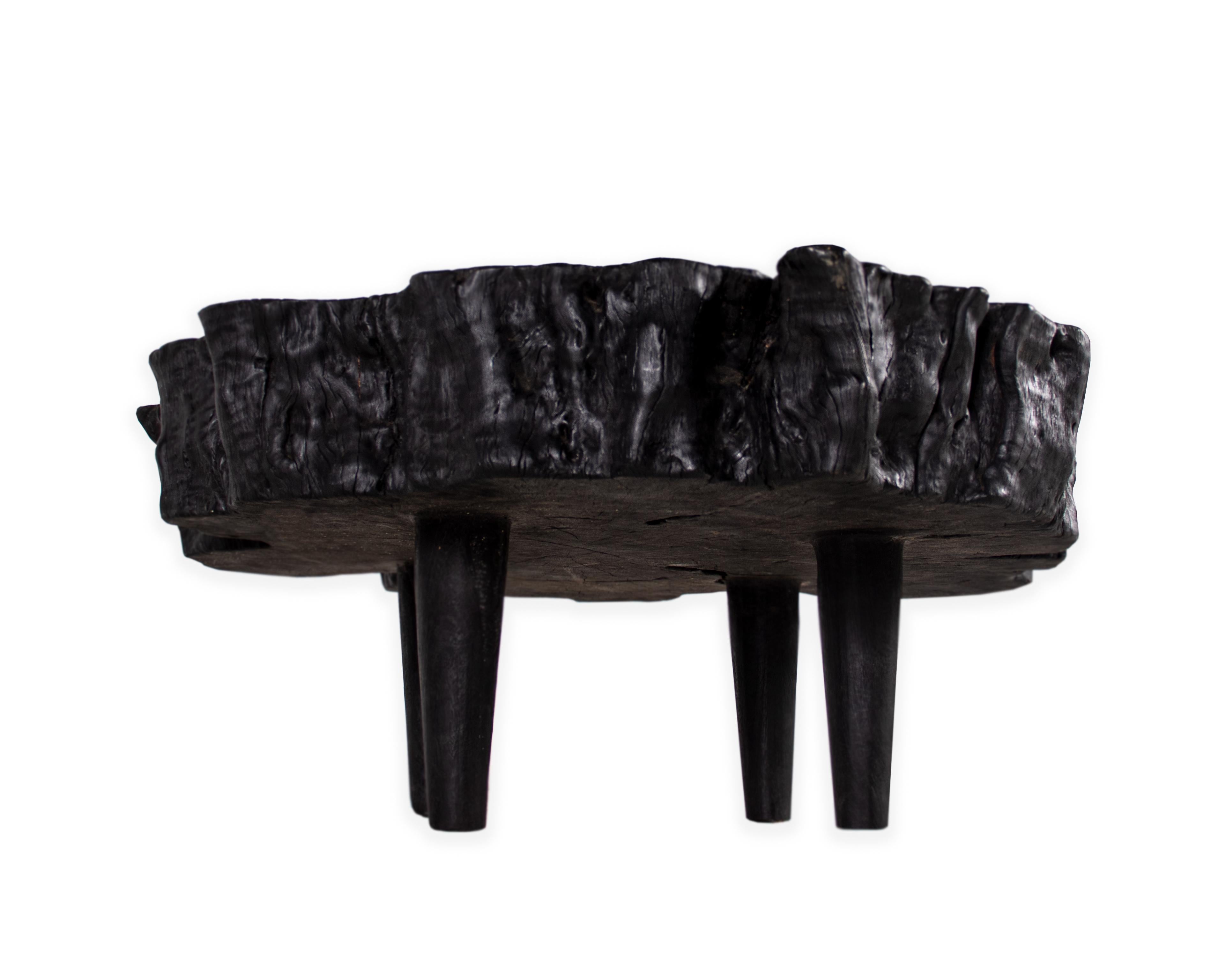 Organic form lychee wood coffee table in an ebony finish. 

Piece from the Le Monde collection. Exclusive to Brendan Bass. 
 