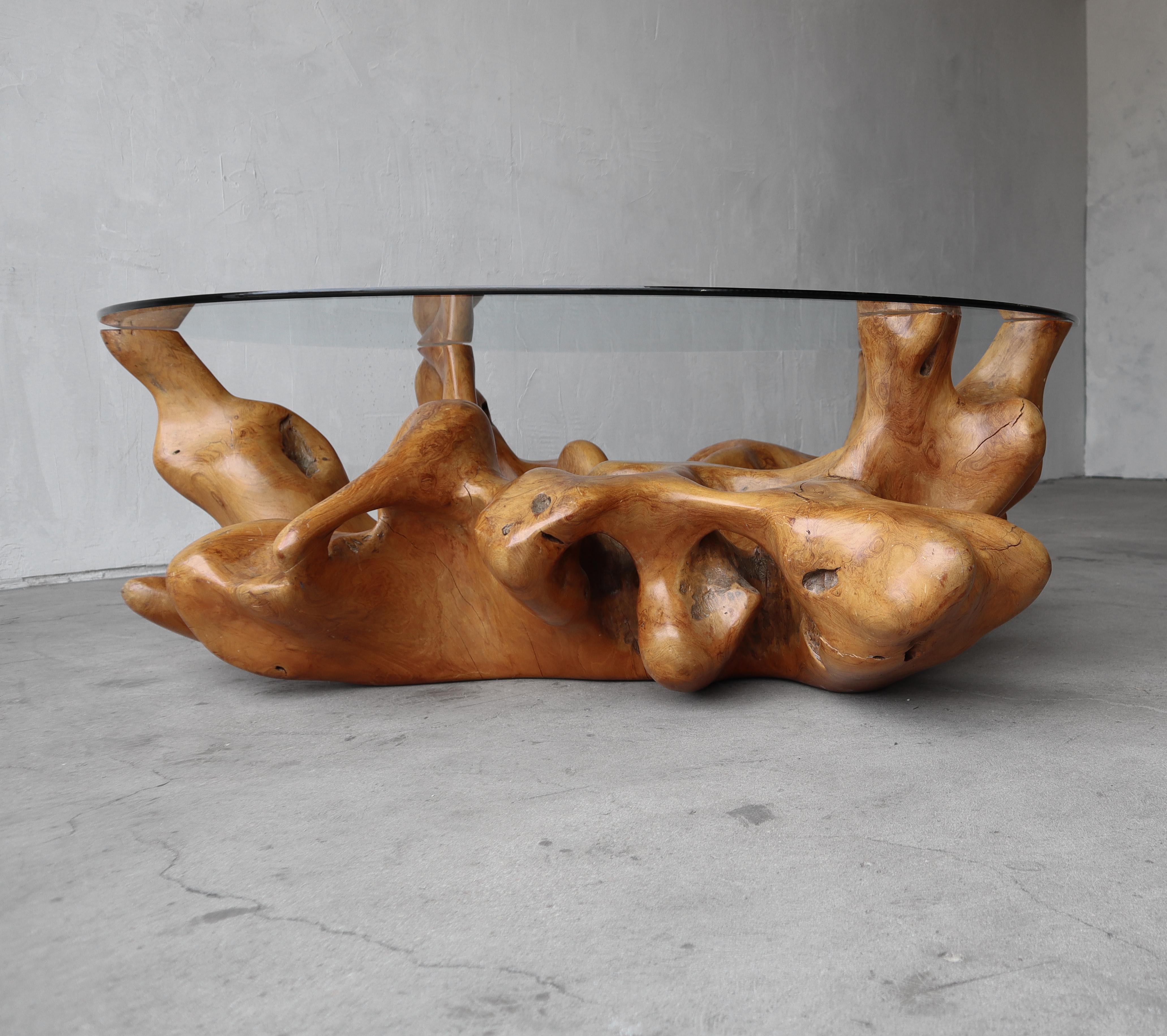 Absolutely stunning, solid burl root wood coffee table base. Base is large and can accommodate a very large piece of glass or stone. This piece is a true piece of art, form and function. 

Table base is in great condition. Glass shown is 50
