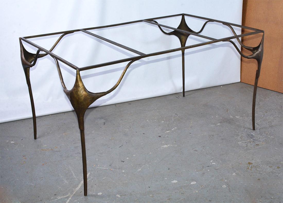 Wonderfully sculptural gold toned freeform expressive amorphic modernist rectangular table base. The table is both minimalist and dramatic.  Can be paired with a top of your choice stone, glass, or wood making it a wonderful dining table for the