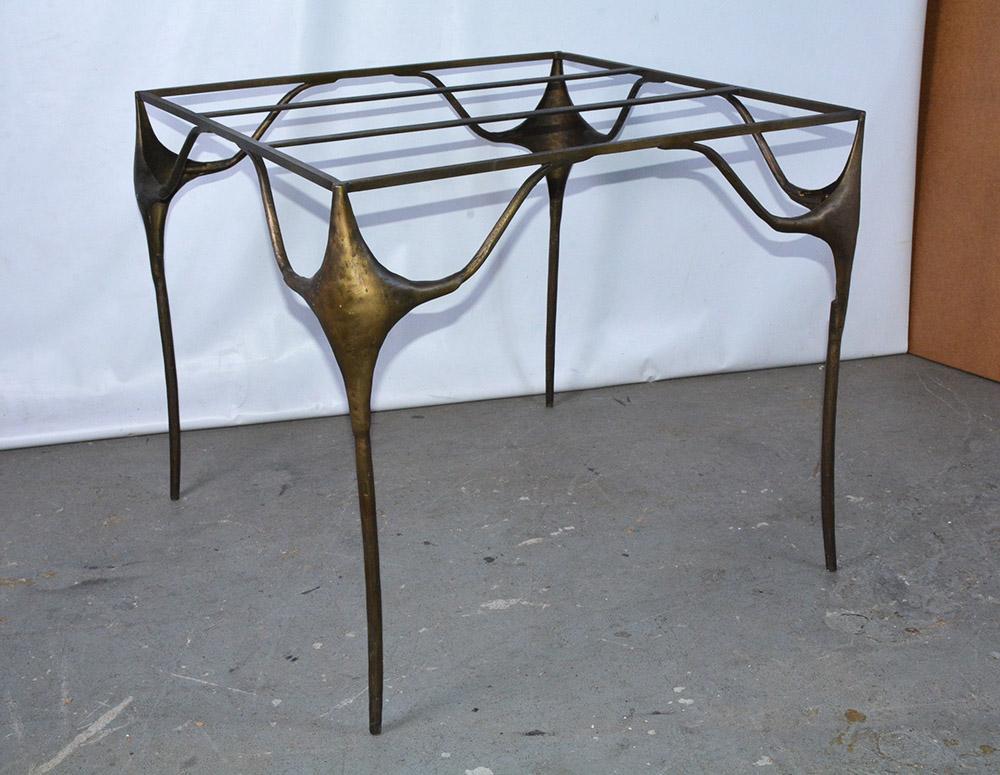 Wonderfully sculptural gold toned freeform expressive amorphic modernist square table base. The table is both minimalist and dramatic.  Can be paired with a top of your choice stone, glass, or wood making it a wonderful dining table for the porch