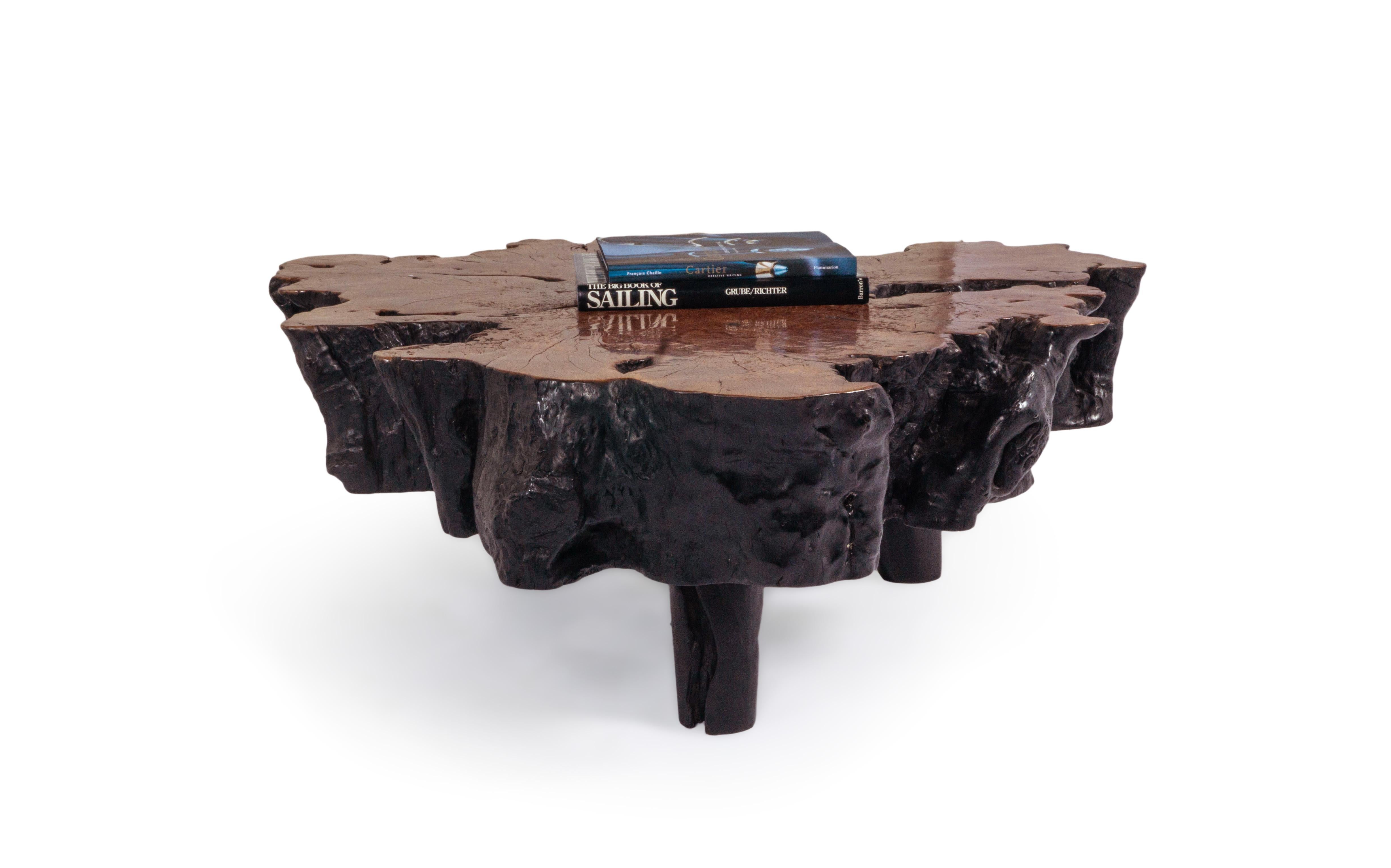 This organic form lychee wood coffee table features a beautiful ebonized exterior and a cinnamon toned top that adds warmth and contrast to any space. 

This piece is a part of Brendan Bass’s one-of-a-kind collection, Le Monde. French for “The