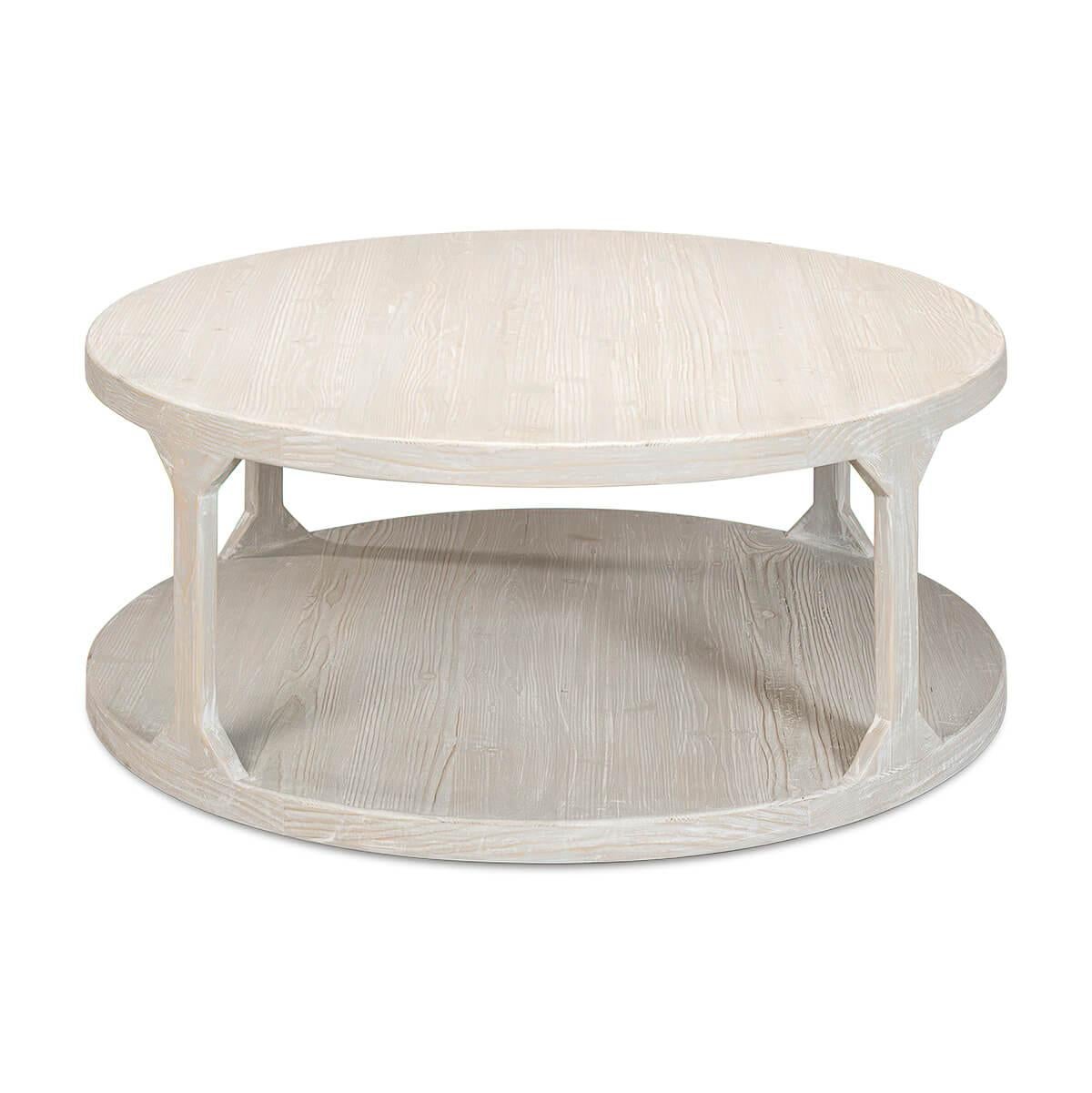 Organic modern round coffee table, the two-tier table finished in a grey wash over pine.

Dimensions: 45