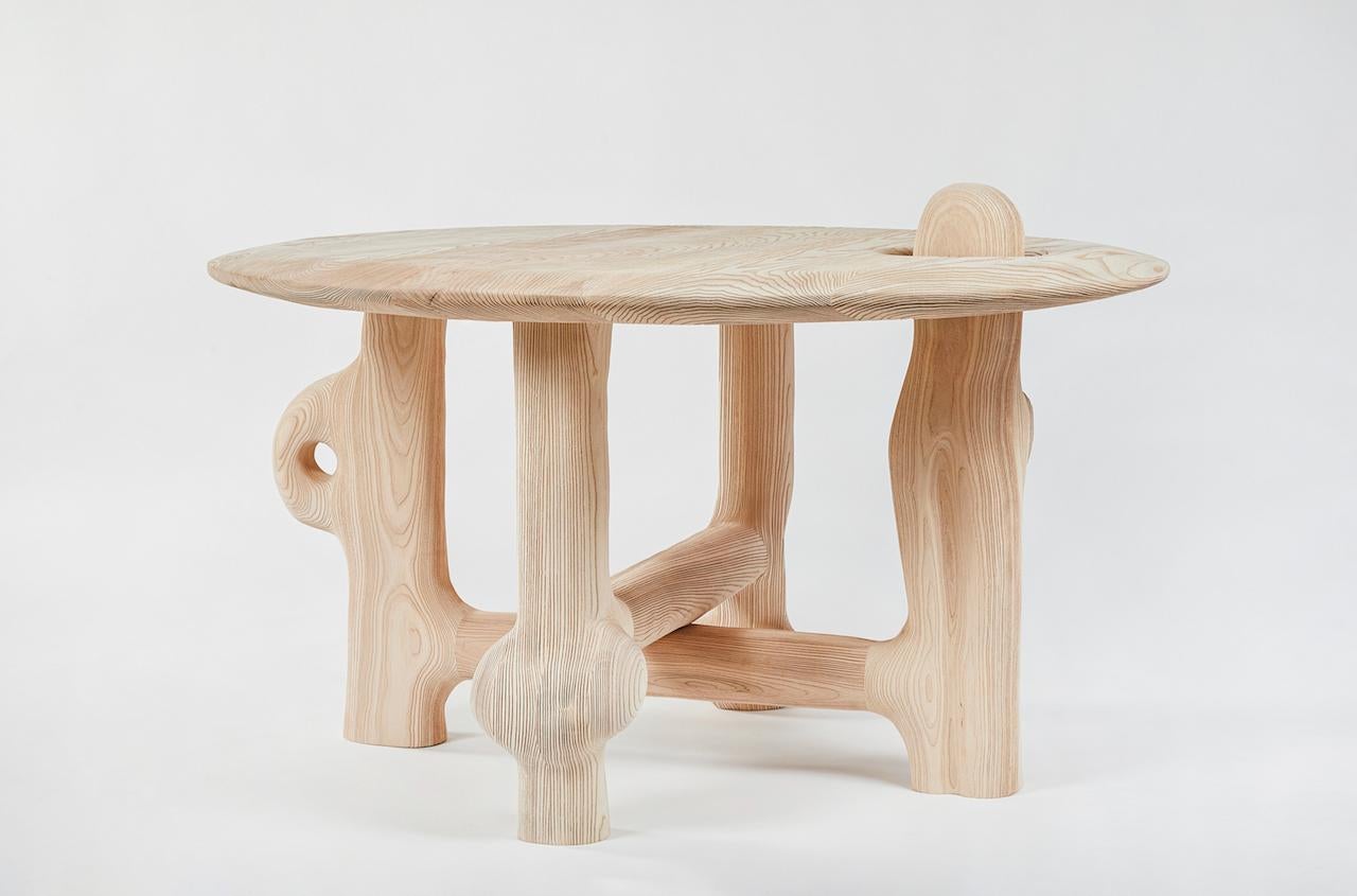 Organic hand carved sculptural dining table in Sandblasted ash. Made in the USA by Casey McCafferty. 

Hello World Sculpture series

Pictures shown of this sculptural piece are a depiction what yours could look like. 

This piece is a one of a