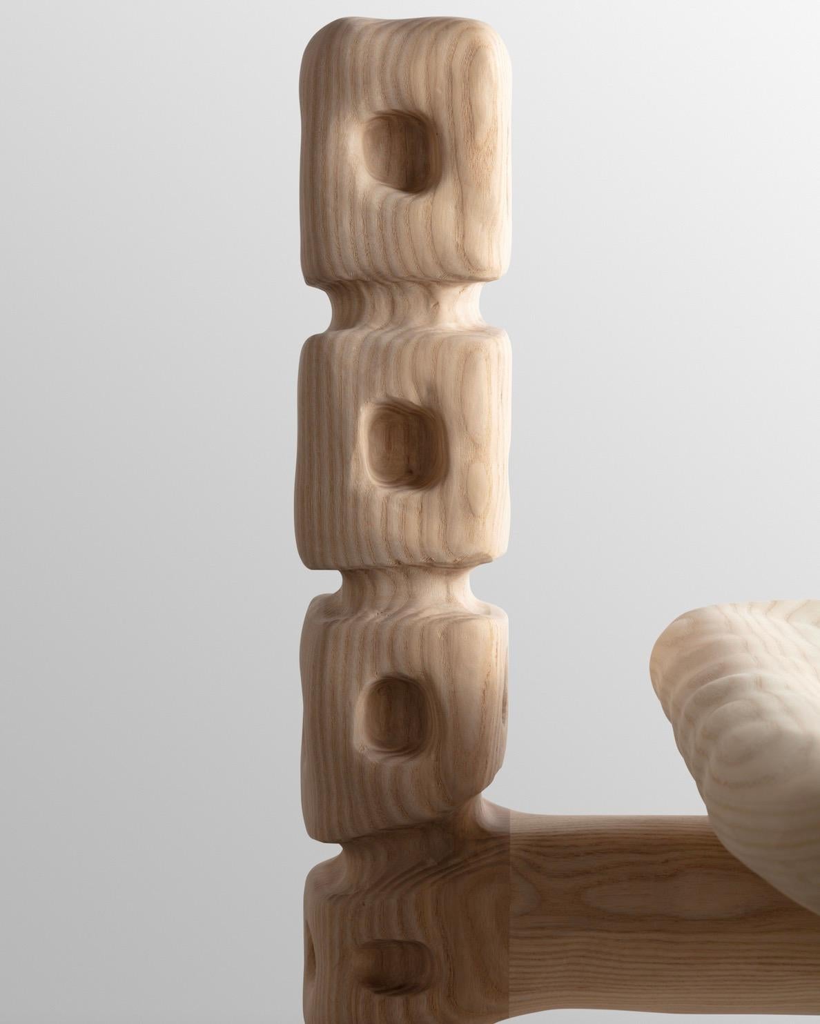 Organic hand carved sculptural chair in ash. Made in the USA by Casey McCafferty.

Pictures shown of this sculptural piece are a depiction what yours could look like. 

This piece is a one of a kind, one of one. 

Available finishes:
Sand