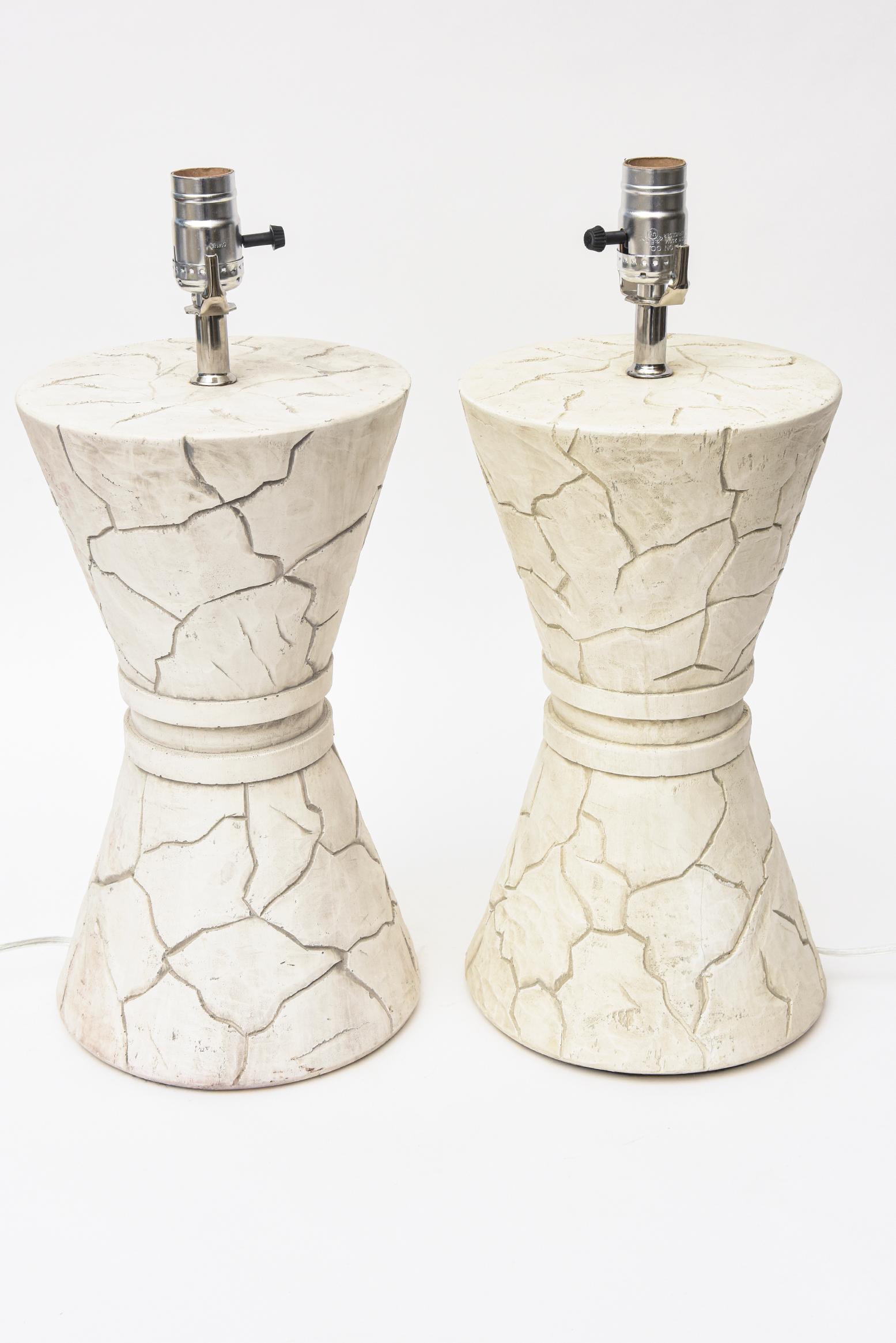 These fabulous pair of ceramic vintage organic modern lamps are initialed but not legible and faded. They are of Japanese artistry and origin. Their pebbled design makes for a great statement piece with their incised bark like style of indentations