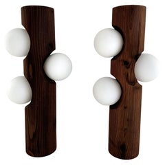 Applique organiche di metà secolo con tronco di pino e sfera di vetro, anni '70