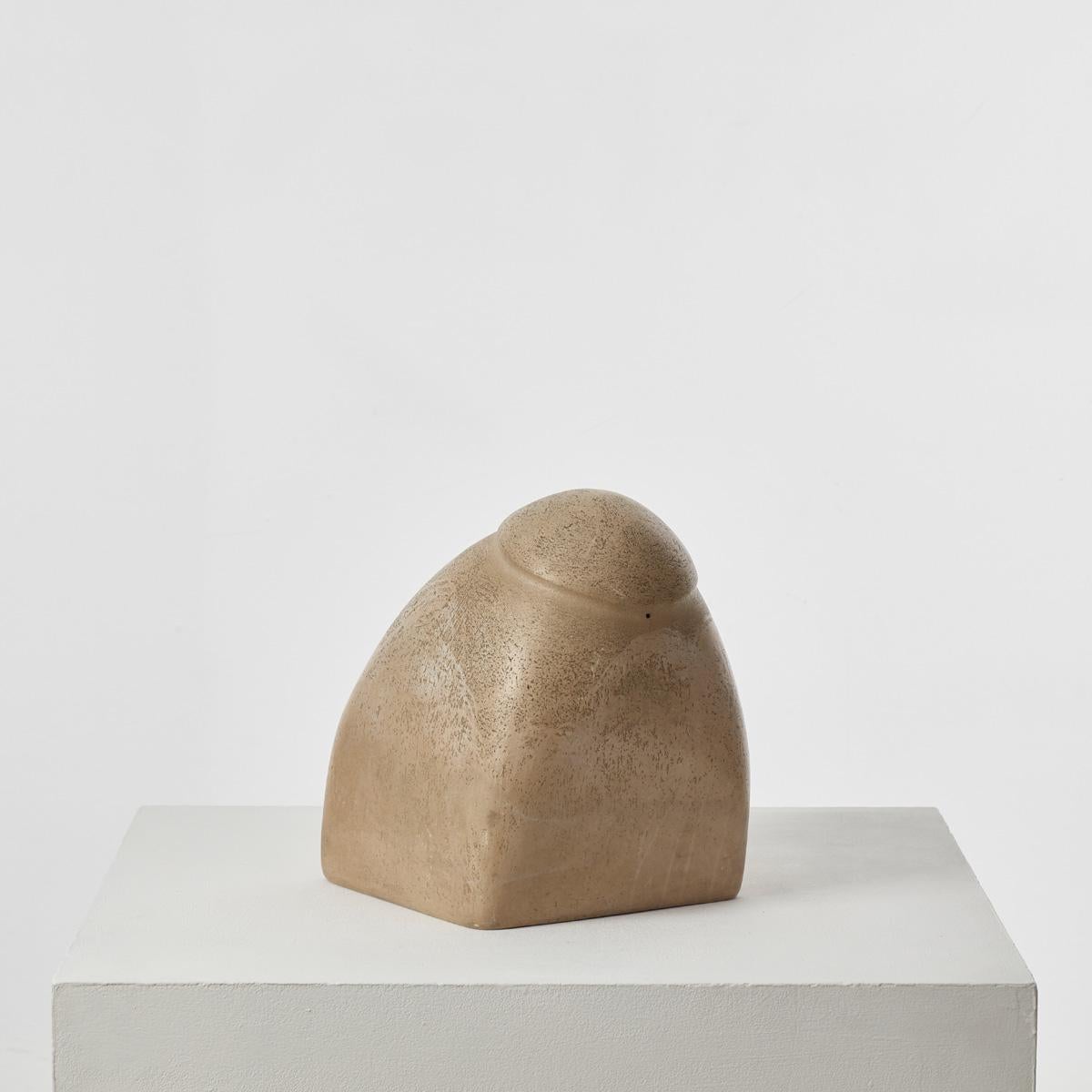 A large, biomorphic plaster sculpture with a burnished finish that sits as a solid piece with a dynamic slanted axis. It was previously owned by Sir Terence Conran (1931 – 2020). Conran, an inimitable design pioneer and businessman, “did more than