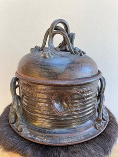 Organic Lidded Stoneware Vessel with Sculptural Handles and Textural Glaze