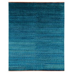 Alfombra orgánica de lujo de seda y lana azul turquesa con extremos rojos de Joseph Carini