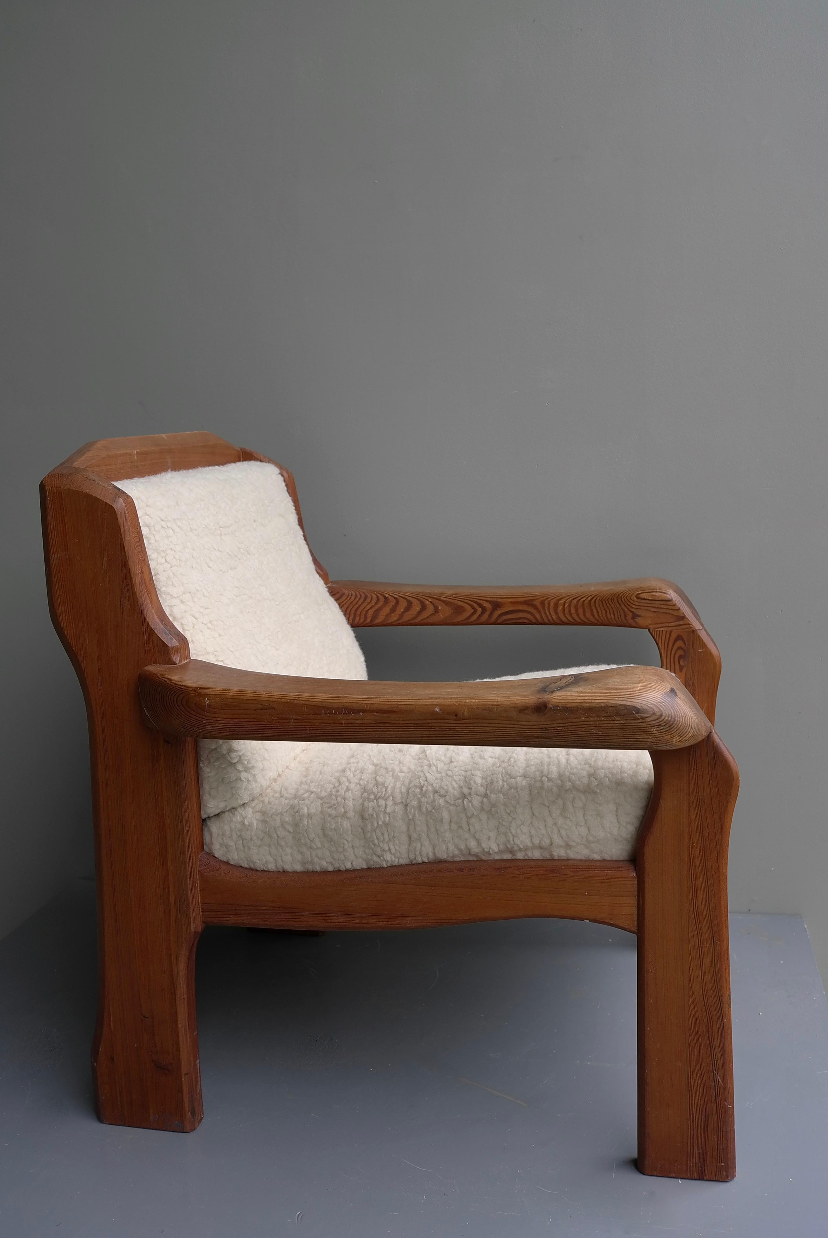 Organic anthroposophical mid-century solid Pine lounge chair with pure Merino Wool Upholstery, 1960's.
      