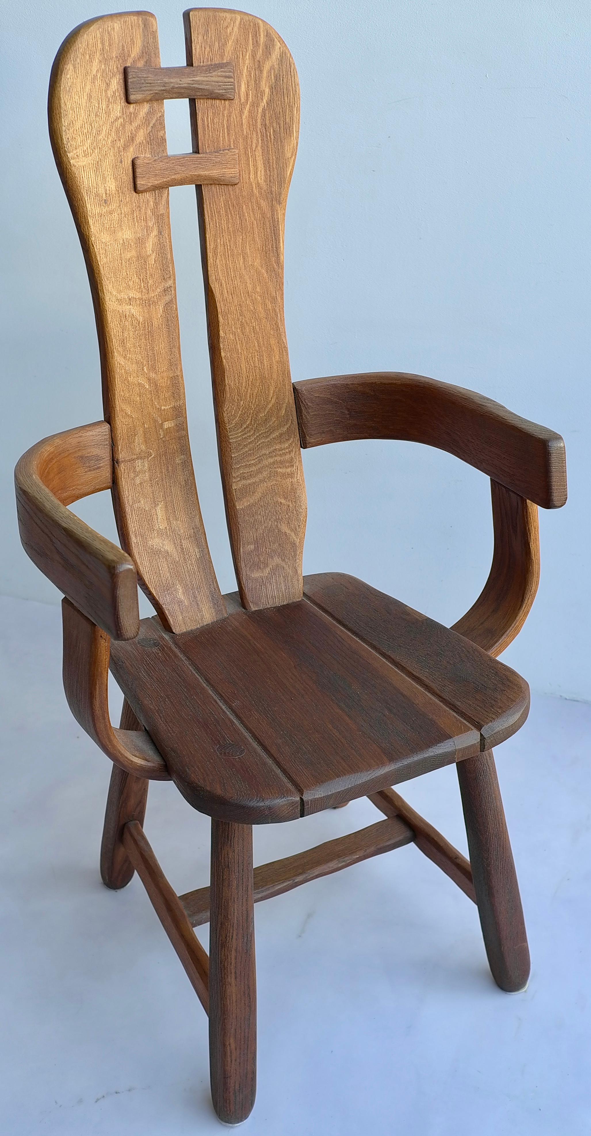 Organic midcentury high back side chair in solid oak.