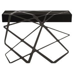 Mesa consola de centro moderna y orgánica Acero negro brillante Laca negra mate