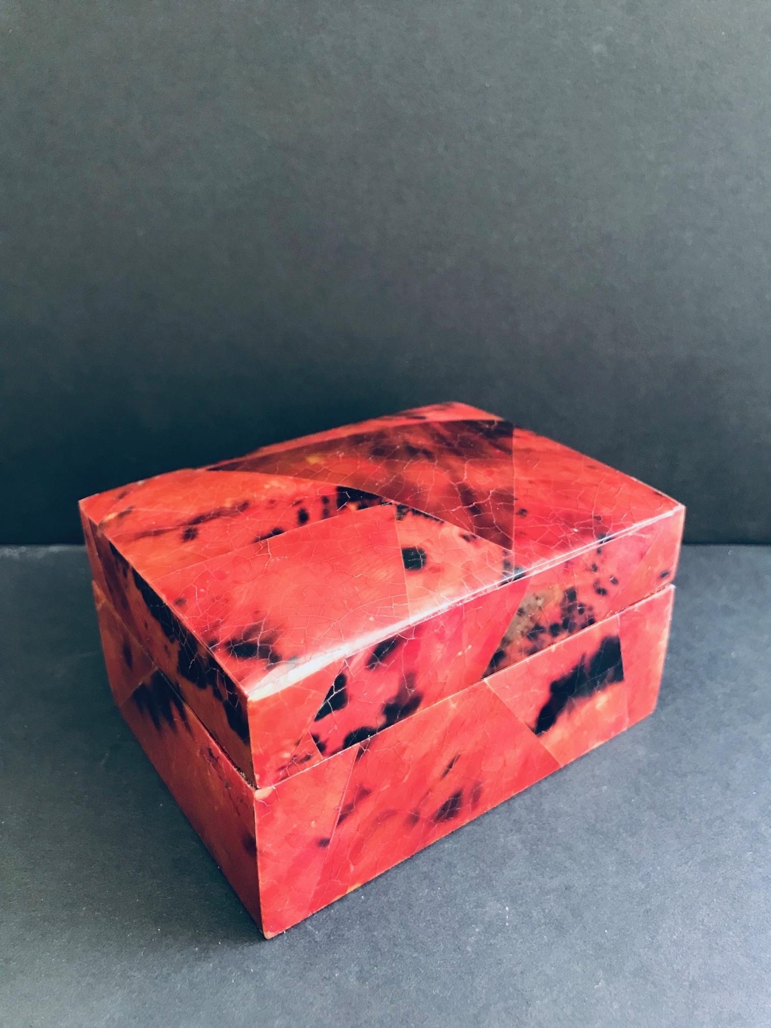 Gorgeous decorative box or jewelry box in tessellated pen-shell. Lacquered and hand-dyed in red and black with mosaic inlays throughout. Lidded Box features palmwood interior and has R&Y Augousti signature on the underside. Other matching