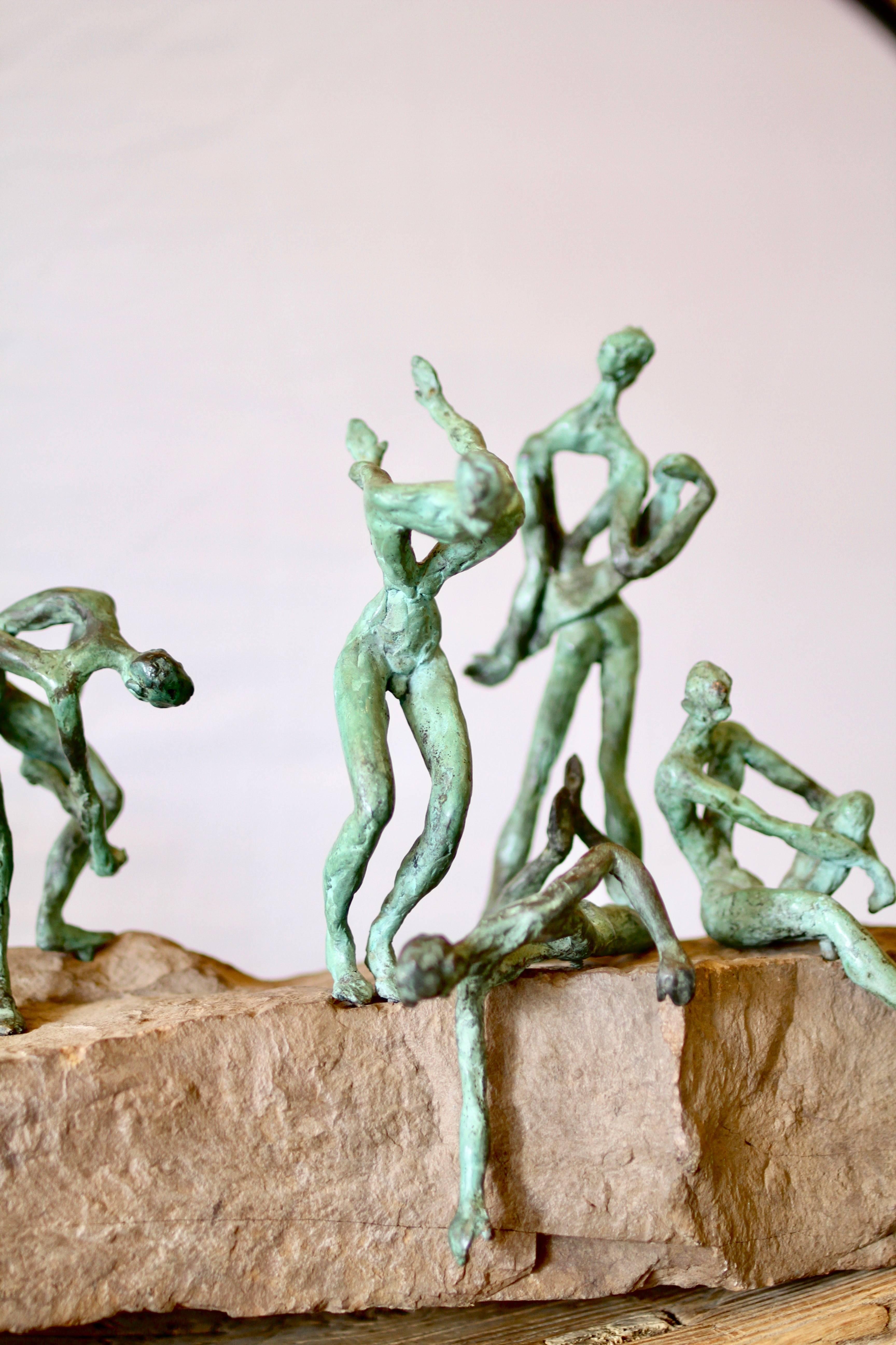 This amazing free-form sculpture is called Afternoons at the River. It almost seems to move when you don't look! Each hand made bronze figure is perfectly sculpted to fit exactly at the spot it is mounted in and fits with pegs at the end of each