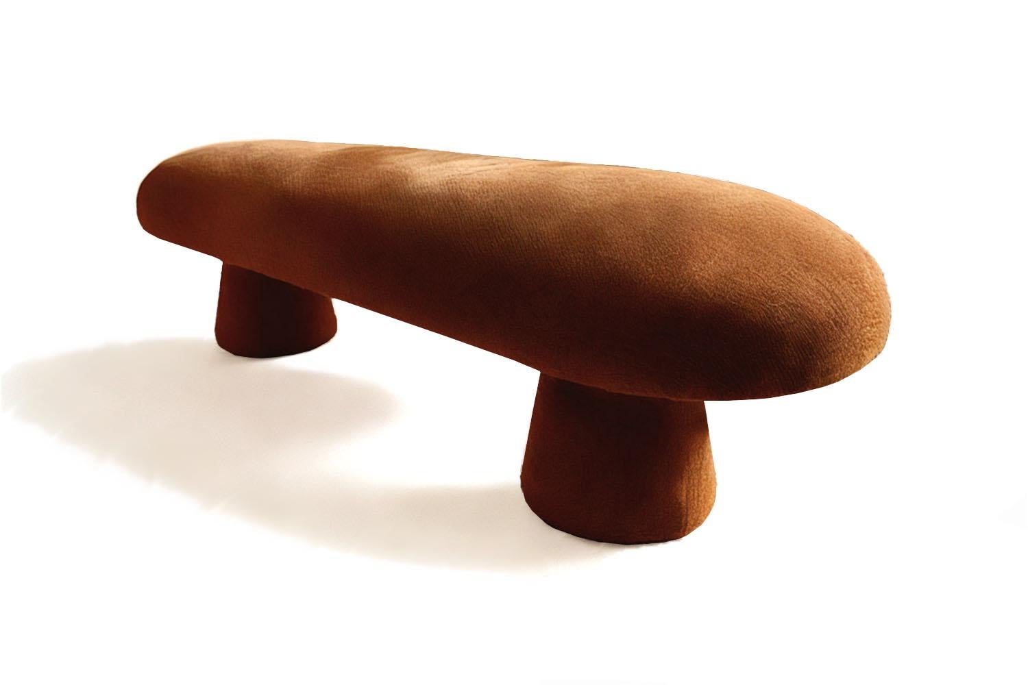 The Éxtasis Bench captures the charged stillness of a moment on the edge—the spark before a revelation, the breath before the leap. With its rounded, organic form and sculptural legs, it radiates contained energy, like something about to