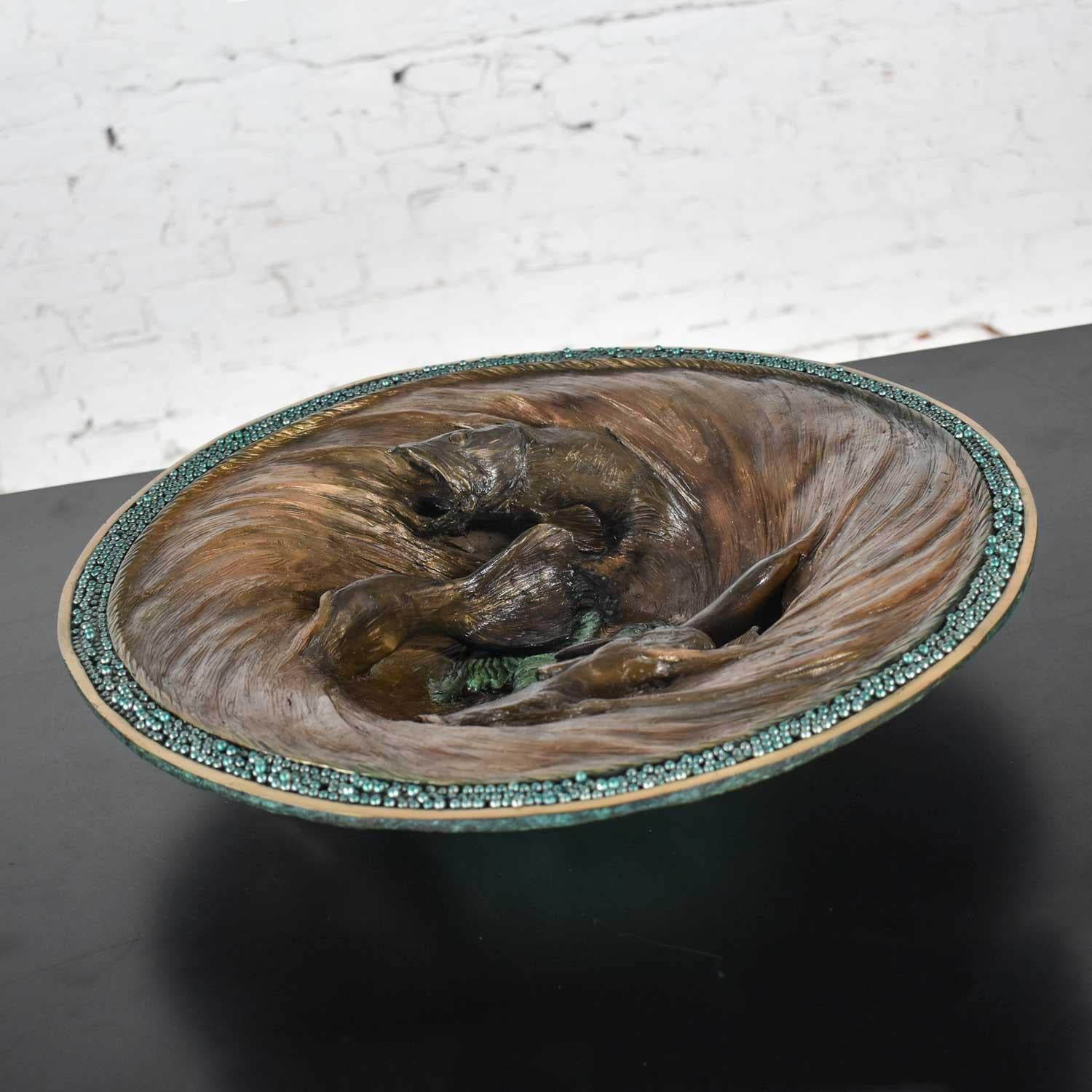 Fabulous organic modern bronze fishbowl sculpture by John Forsythe comprised of cast bronze with golden bronze and green patination. Gorgeous vintage condition with no outstanding flaws that we have found. Please see photos. Circa 1993.

No human