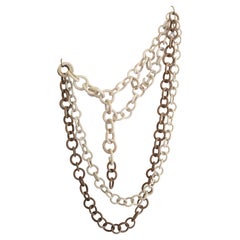 Organic modern ceramic link chain wall sculpture