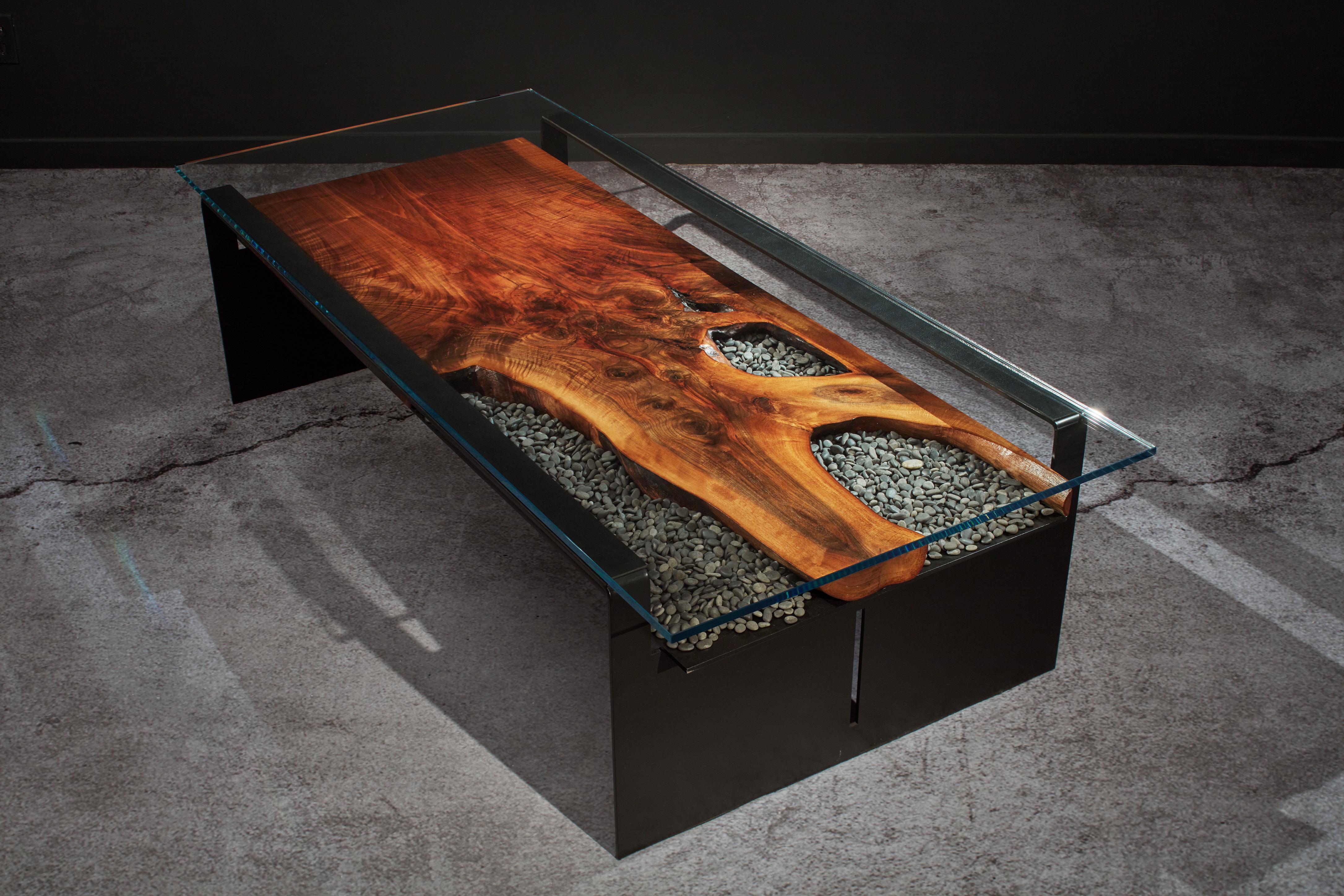 Burnt Forest cocktail table is conceived, designed and created by award-winning artist and architectural designer Michael Olshefski of Primal Modern. Inspired by nature's rebirth after fire, the gorgeous highly figured Black Walnut is conceived as a