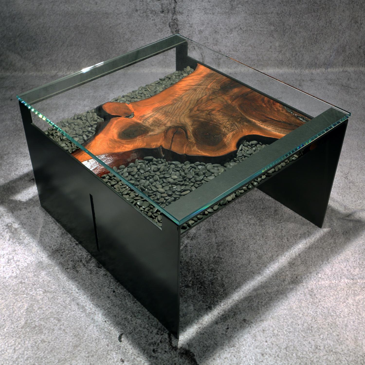Kojima (Island) cocktail table is conceived, designed and created by award-winning artist and architectural designer Michael Olshefski of Primal Modern. Inspired by the interactions between land and water, this gorgeous table showcasing highly