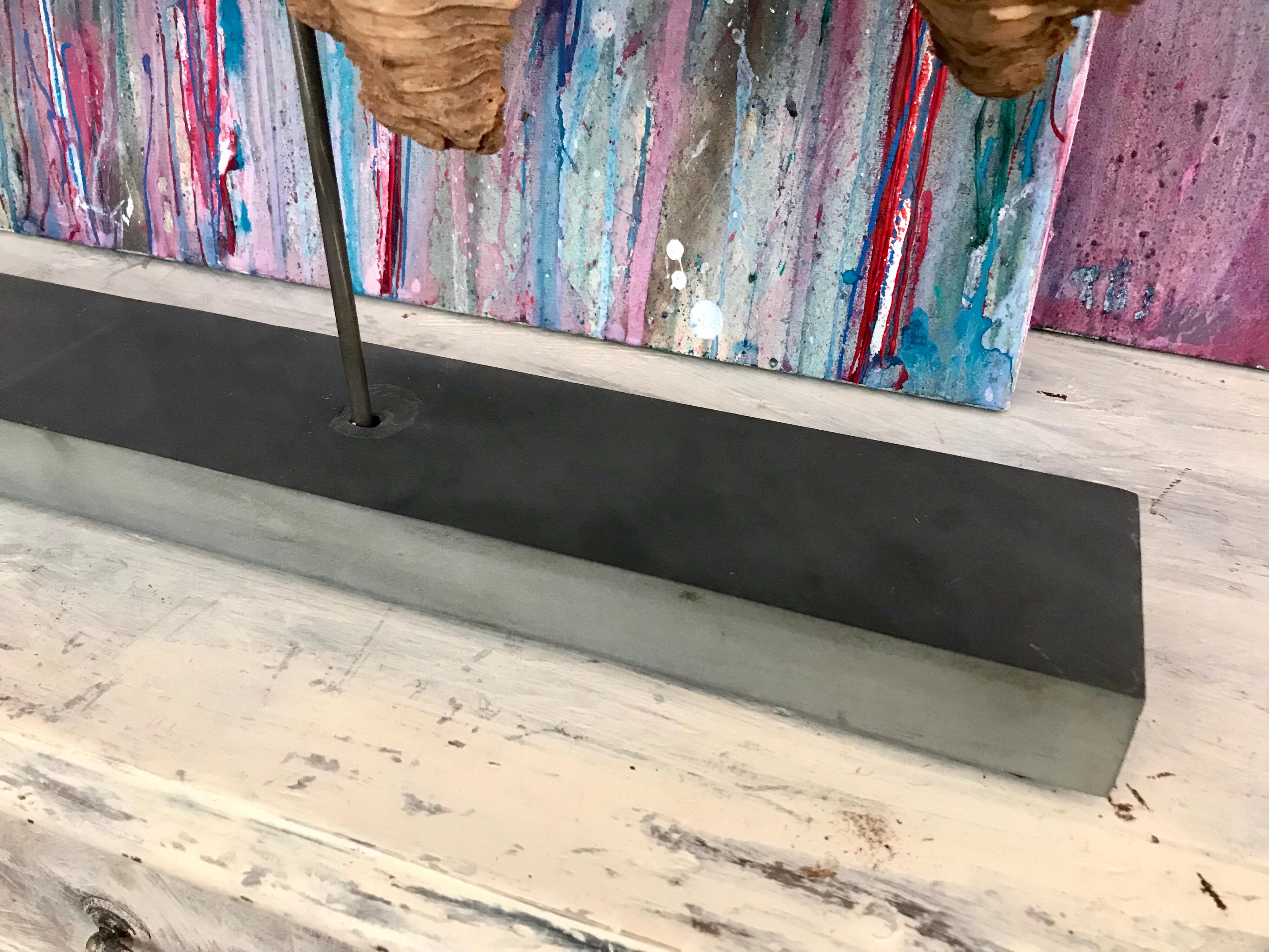 A captivating and attractive organic modern wood and soapstone decorative mantel (fireplace) sculpture. The warm and soothing earth tones, all natural and real, give the viewer peaceful and calm vibes. The aged and antique hemlock log has worn away