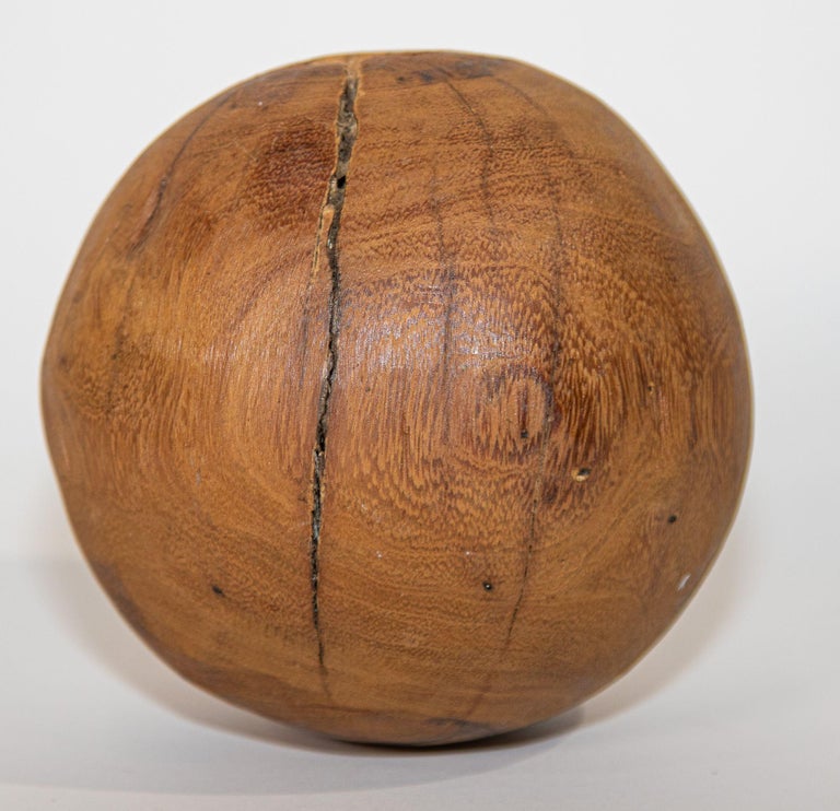 Vintage teak wood root sphere ball with hand wax finish with a unique texture and an organic feel.
This piece is crafted from natural solid wood with an interesting design element and shape.
Great to use this teak wood ball as a beautiful tabletop