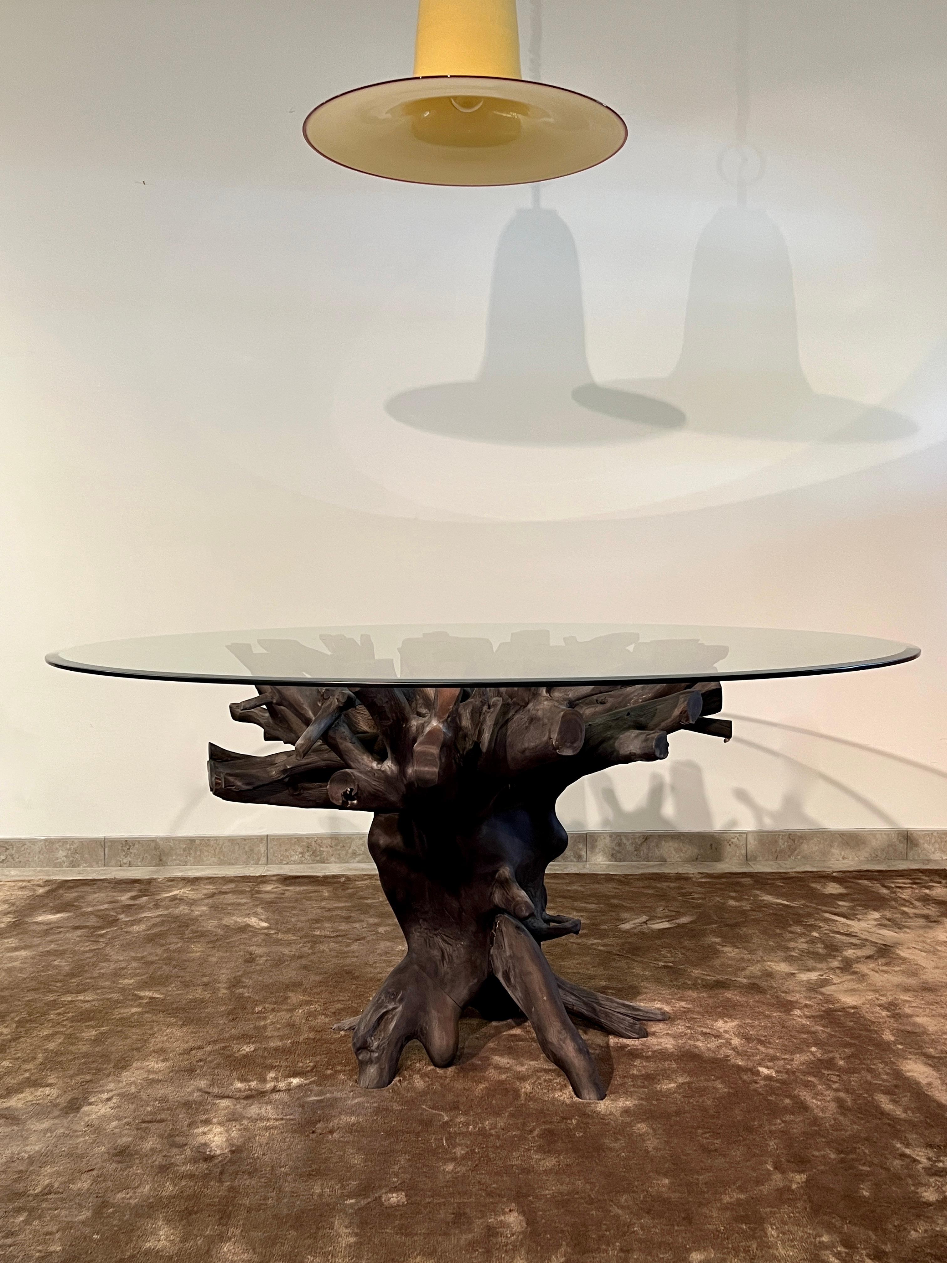 Dining Table in Charred Teak Root Wood and Glass, Indonesia In Good Condition For Sale In Fort Lauderdale, FL