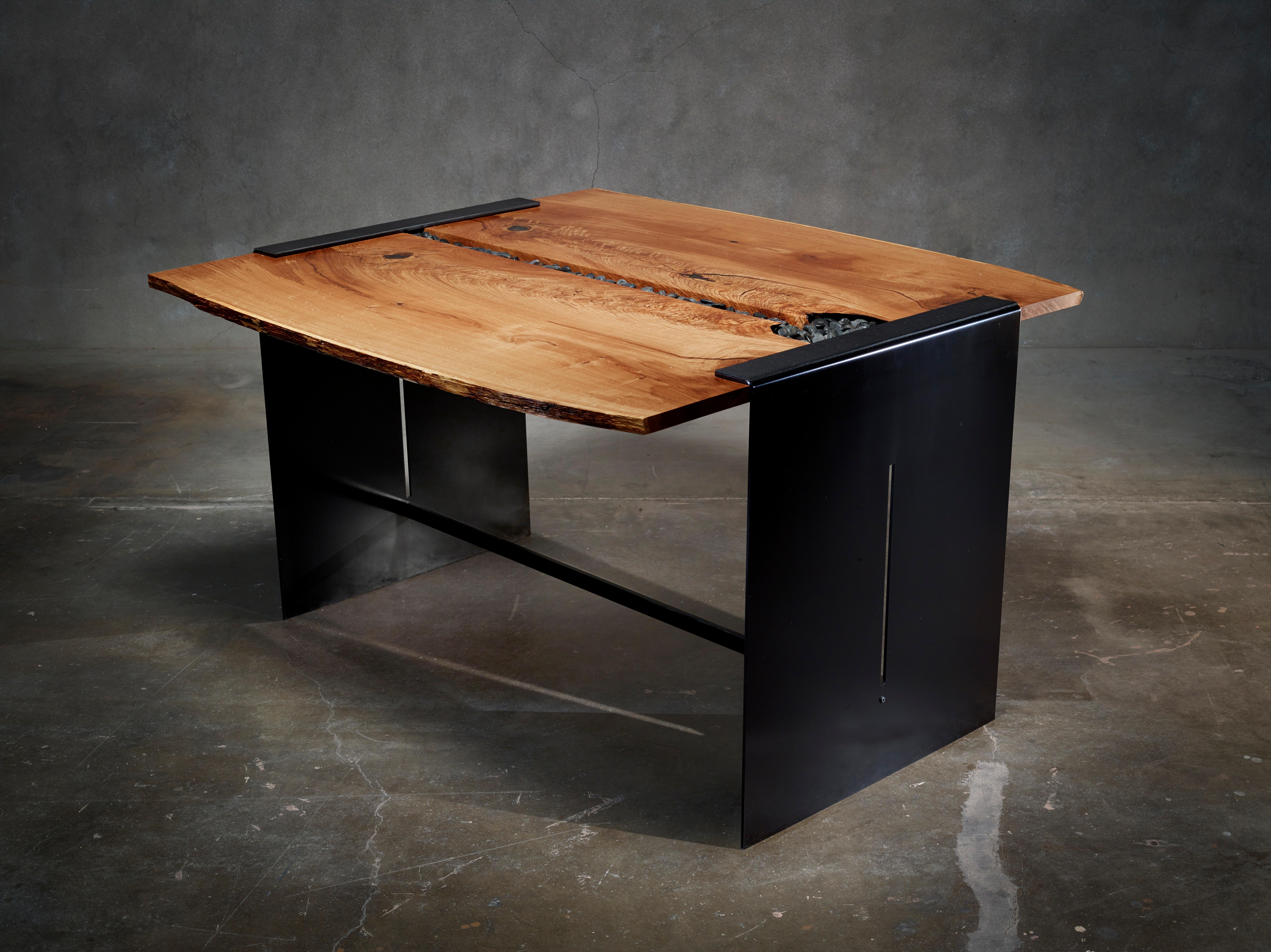 Tranquility dining table is conceived, designed and created by award-winning artist and architectural designer Michael Olshefski of Primal Modern. Inspired by nature and bonsai, this serene dining table showcases a stunning and rare old-growth