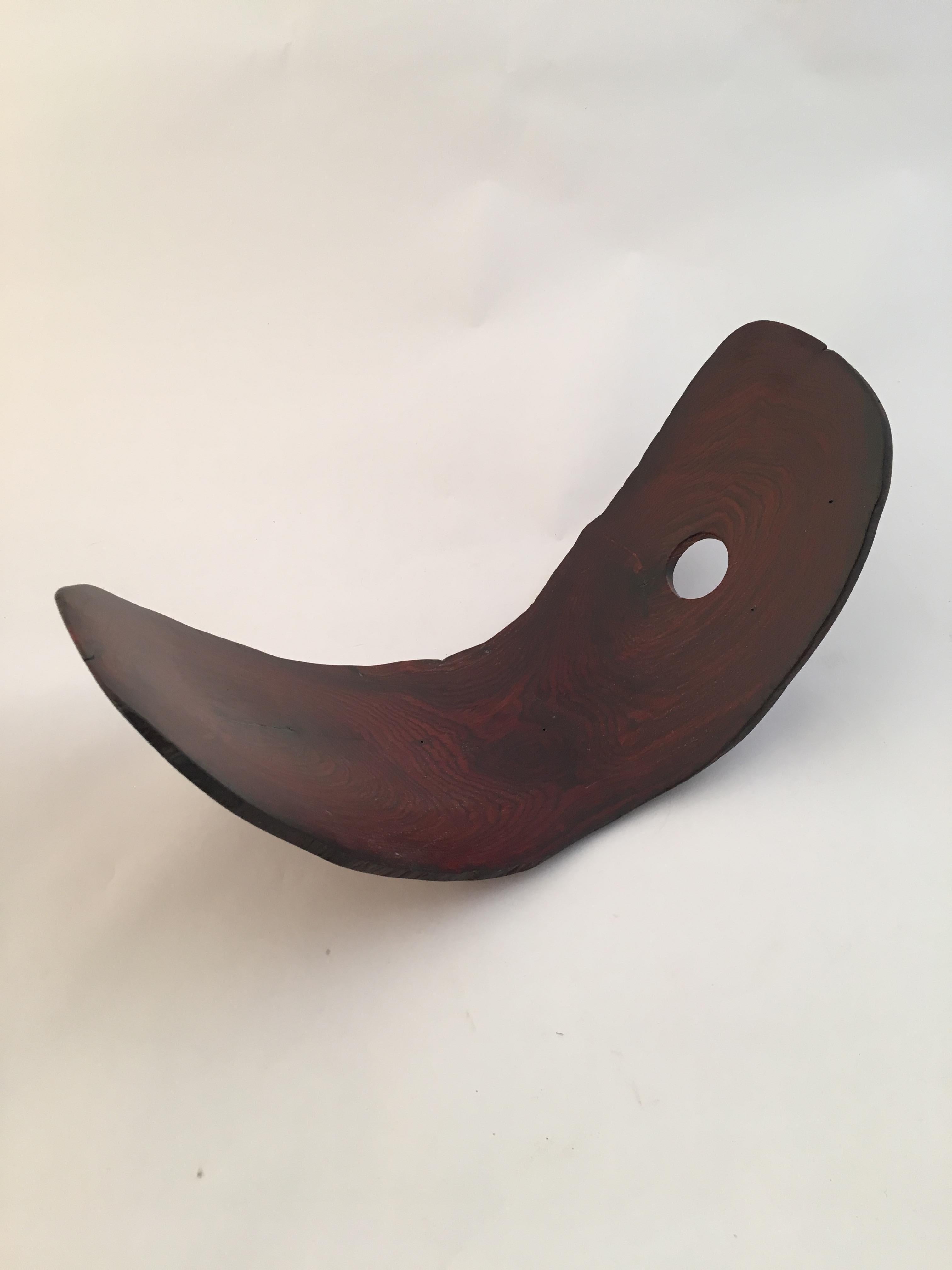 A different way to display and decant your wine. Made of a thin durable free edge slab of bent rosewood 1970s American Crafts Movement. Very good condition.