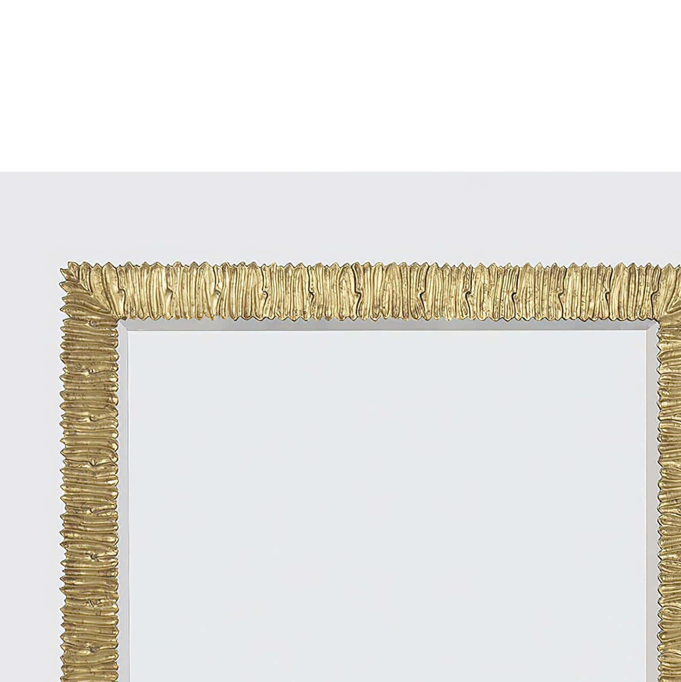 An organic modern silver leaf formed and molded rectangular wall mirror. This mirror can be hung horizontally or vertically. The silver leaf finish is applied to an aluminum cast frame.

Dimensions: 38
