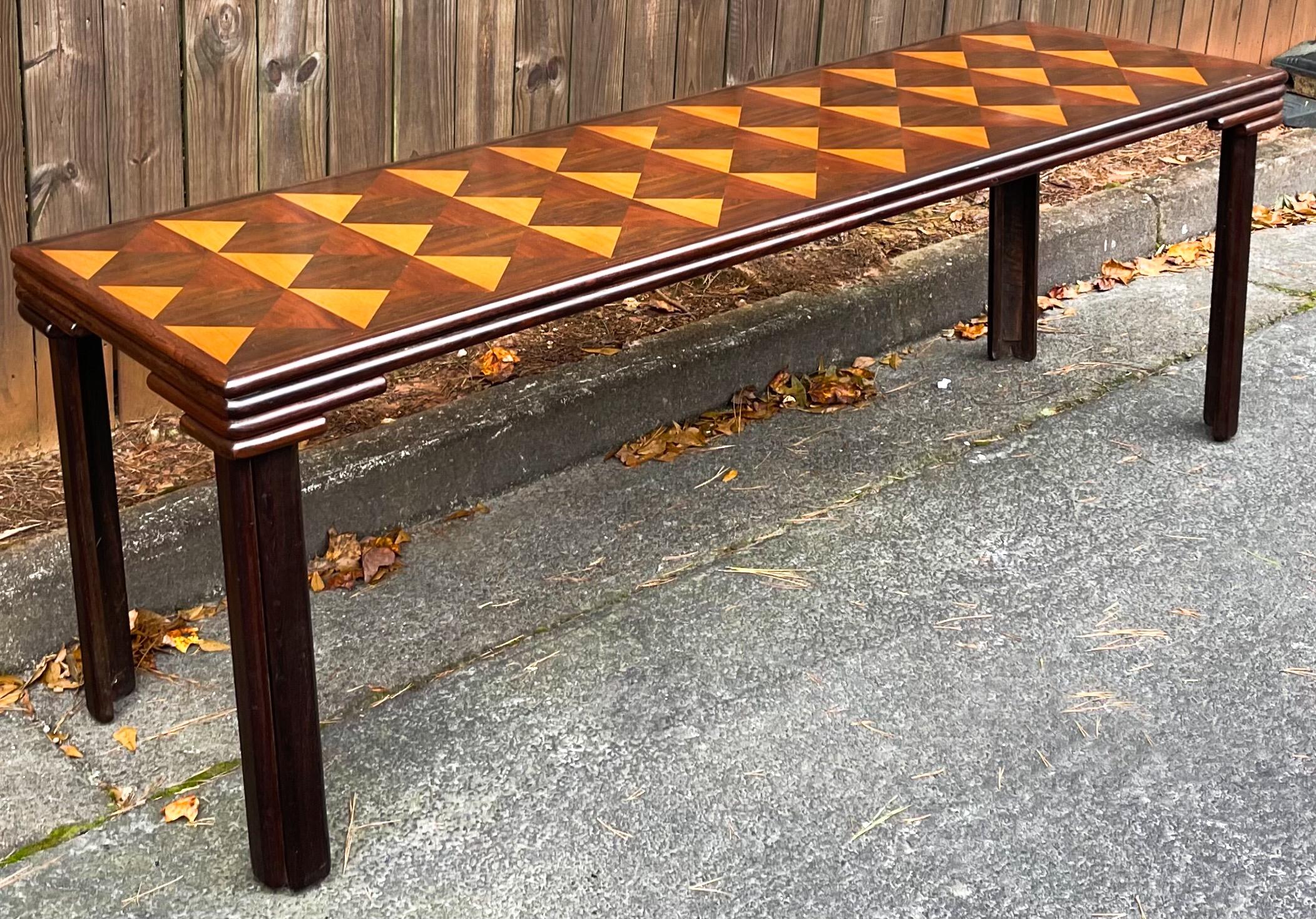 This table is incredible! The size makes it versatile but in a different way. The outer portion is mahogany, and the triangles are a mix of woods. It is unmarked and in very good condition.