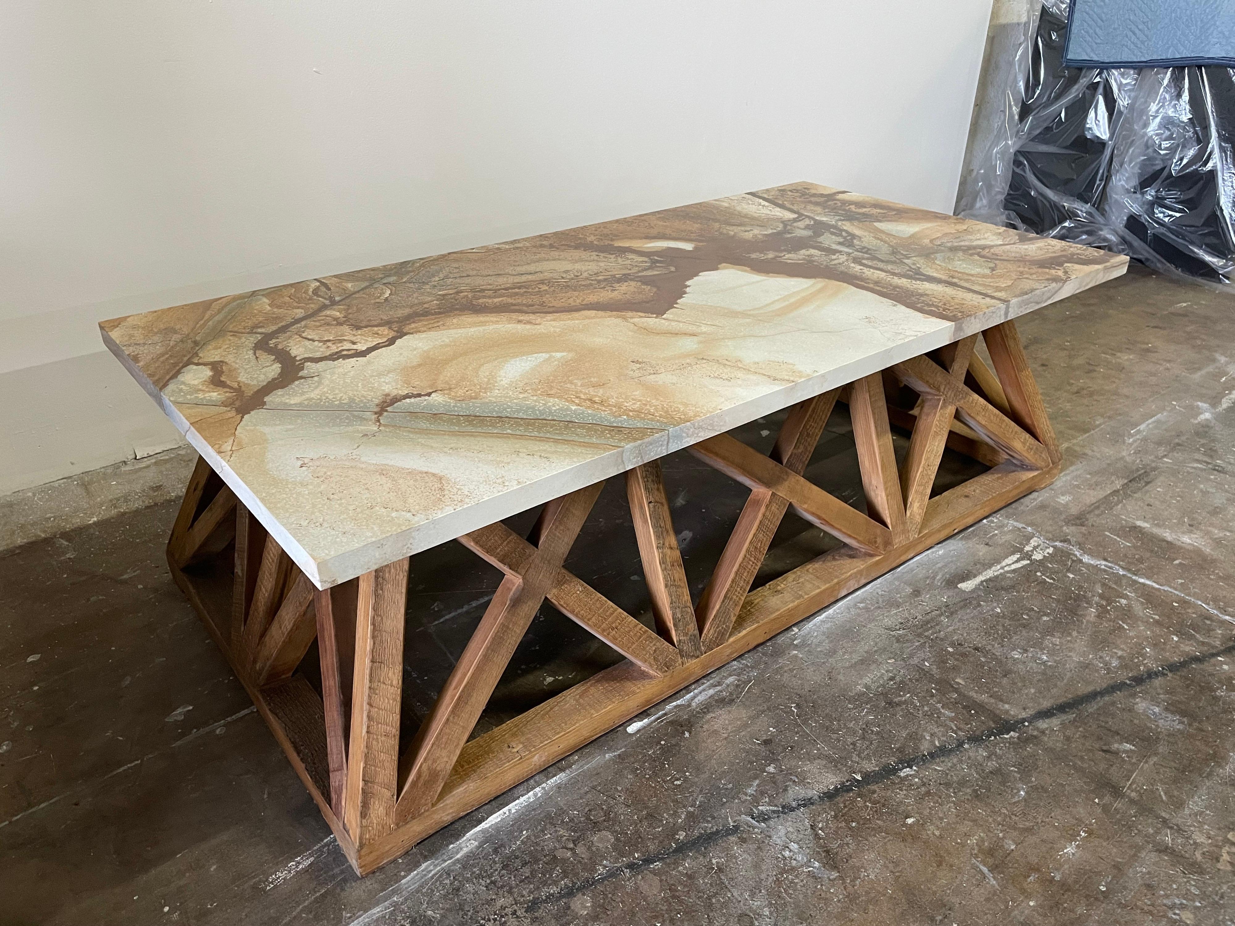 This is one of a pair available. Rustic and organic latticed base with flare out design. The siena marble top has beautiful neutral coloring and is perfect for any modern or beach decor! Wood is naturally varied in colors which work beautifully with