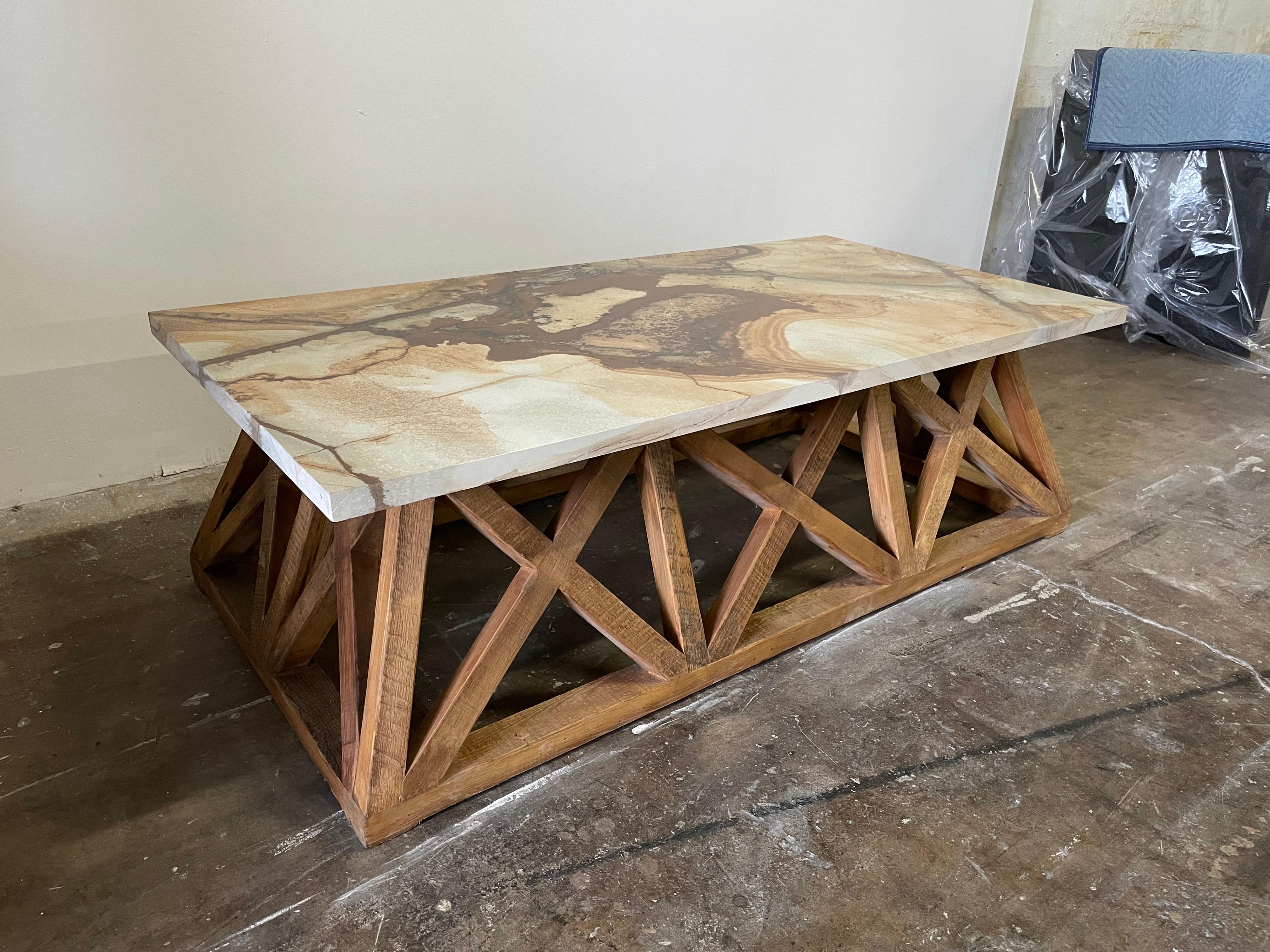 This is one of a pair available. Rustic and organic latticed base with flare out design. The siena marble top has beautiful neutral coloring and is perfect for any modern or beach decor! Wood is naturally varied in colors which work beautifully with