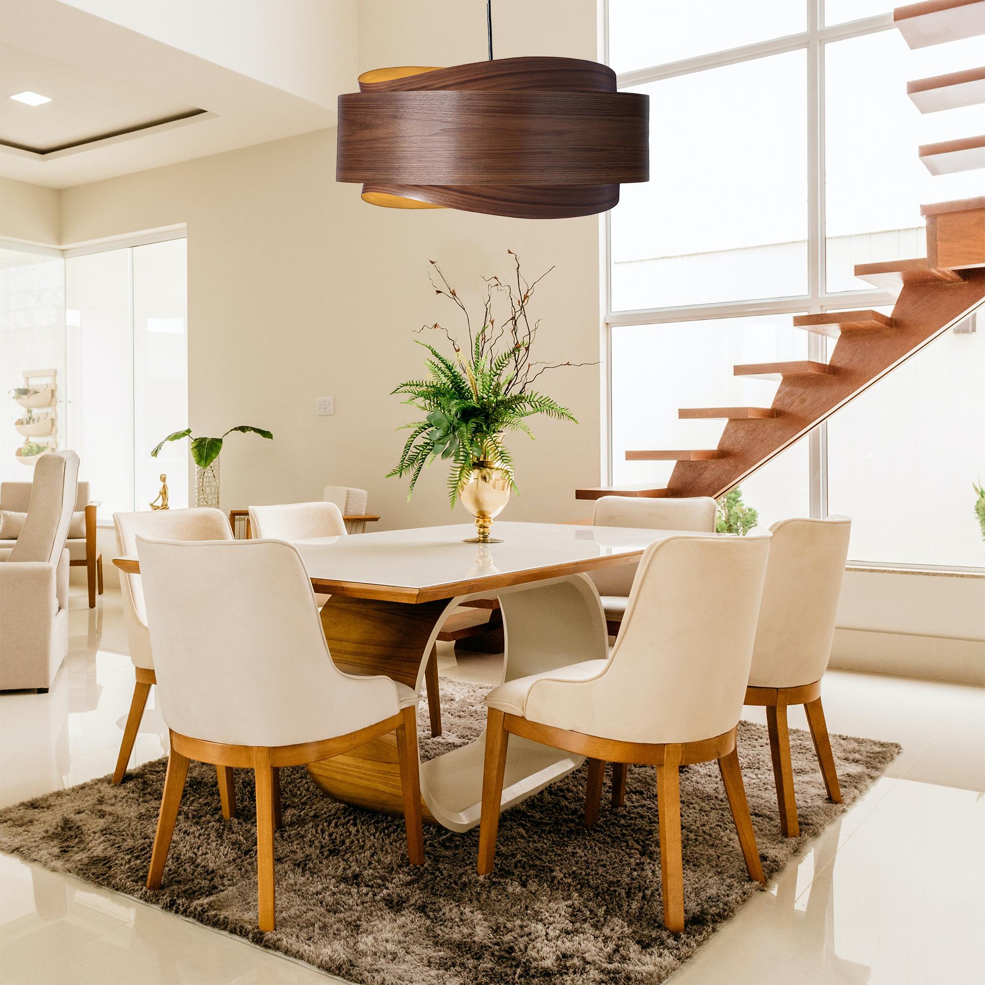 The BOWEN light fixture is a stunning example of contemporary Mid-Century Modern design. With its minimalist silhouette, warm walnut tones, and unique shape, this pendant light is sure to add a touch of sophistication to any space.

The BOWEN light