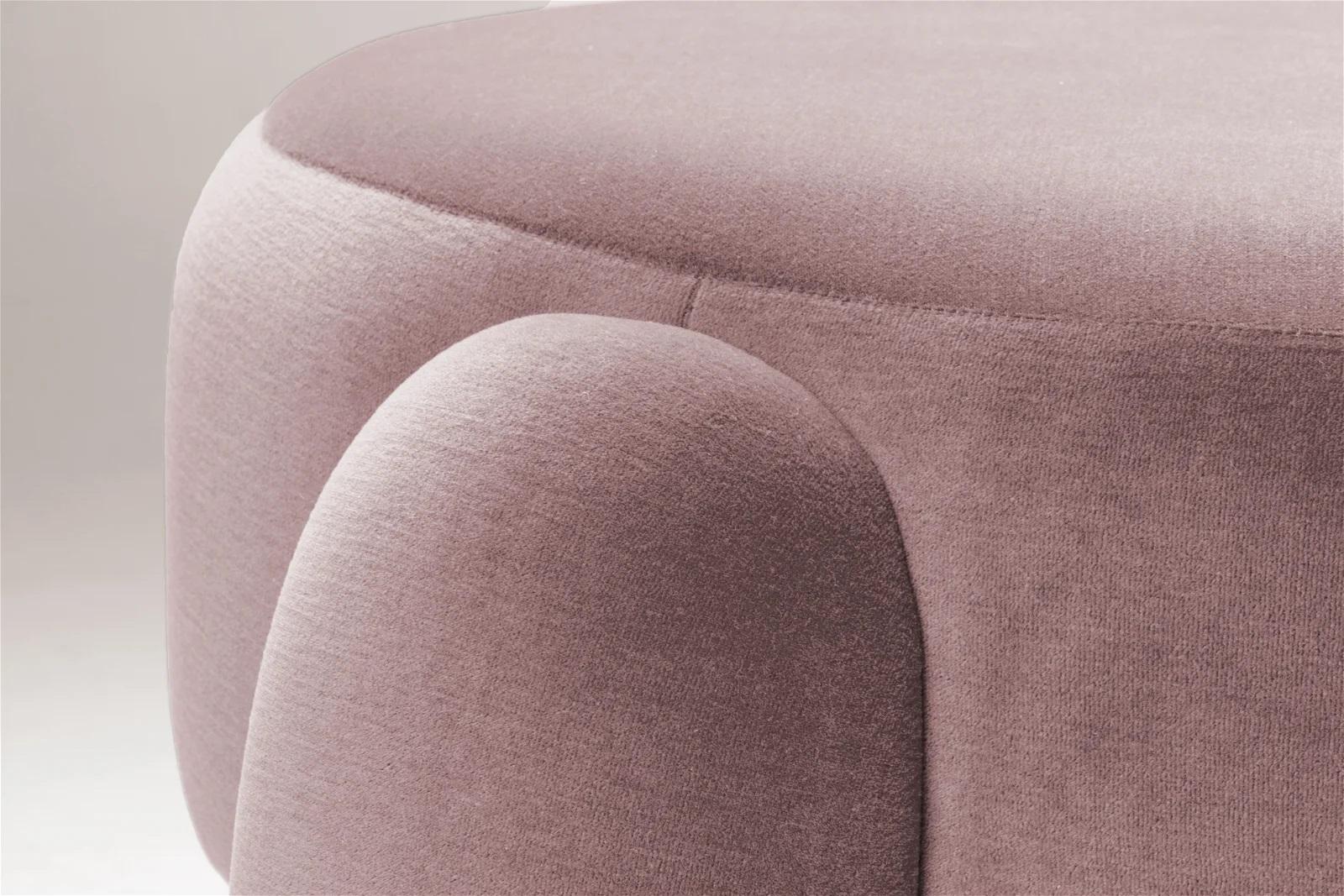When pure geometry meets soft curves, something sculptural and sensual comes out. A fine dialogue between oversized legs and clean lines takes place in this piece upholstered in mohair velvet. Marlon is edgy and elegant at the same time, letting the