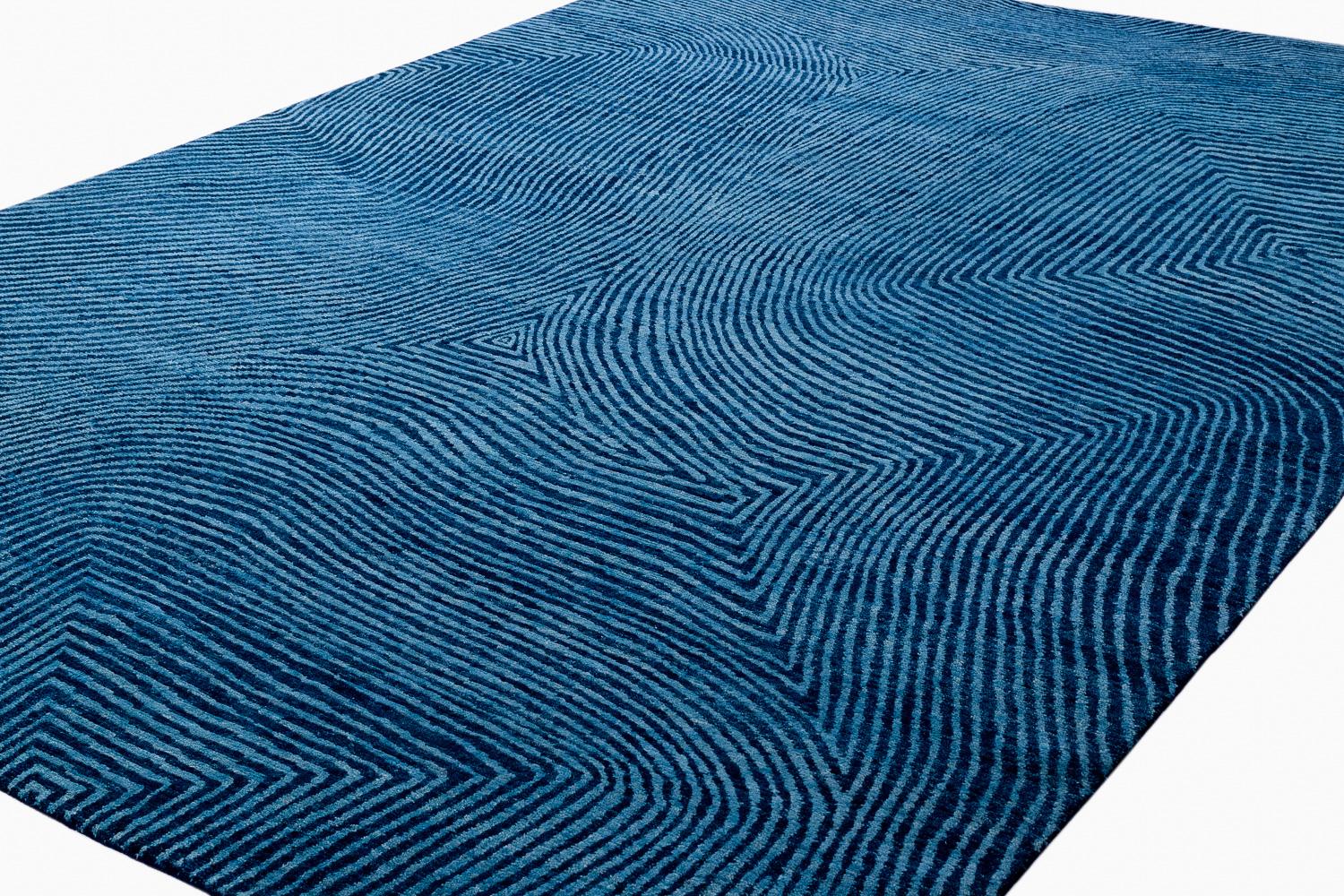 A labyrinth of organic lines create energy and texture in one of the newest additions to the Carini Signature Collection. Woven in our original Shiva Puri weave, this rug is made with lush Himalayan wool.