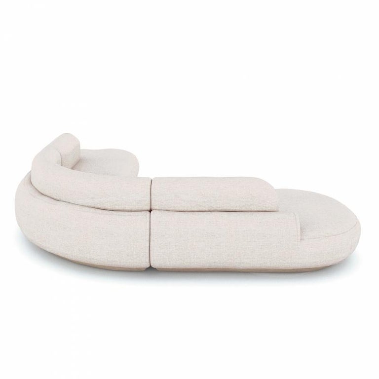 Naked sofa reveals sculptural and organic shapes meant to embrace the user and encourage to stay seated in this cozy and comfortable piece. With comfort as the constant starting-point in this design, the curvaceous, organic shapes and flawless